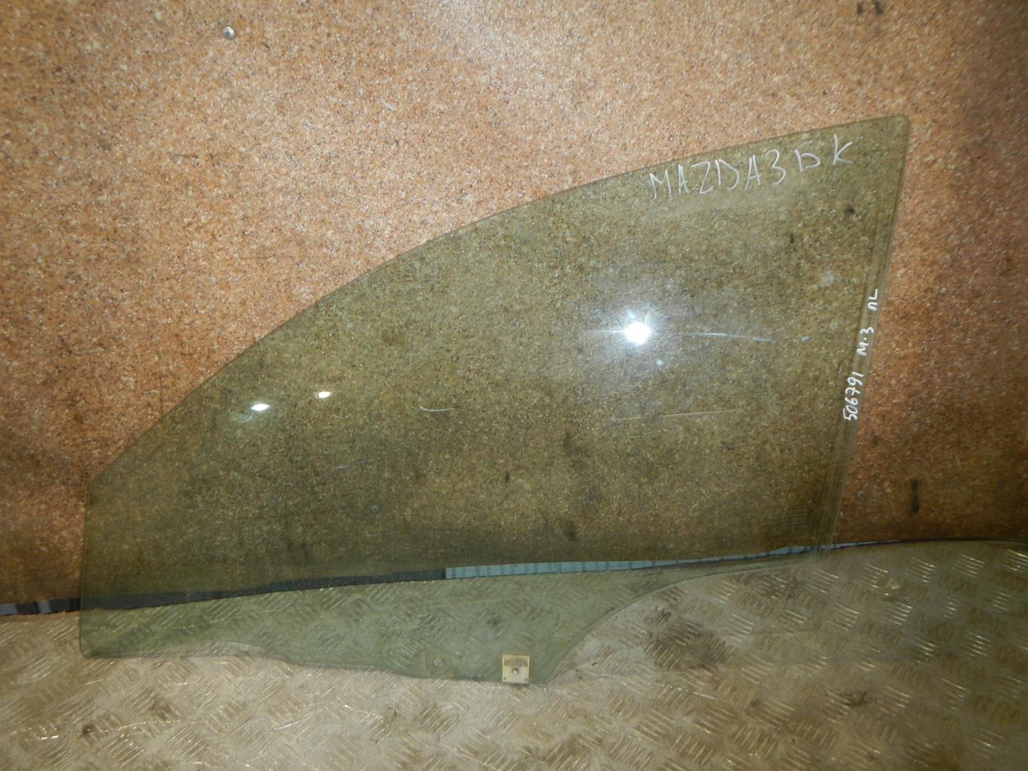 Стекло двери передней левой