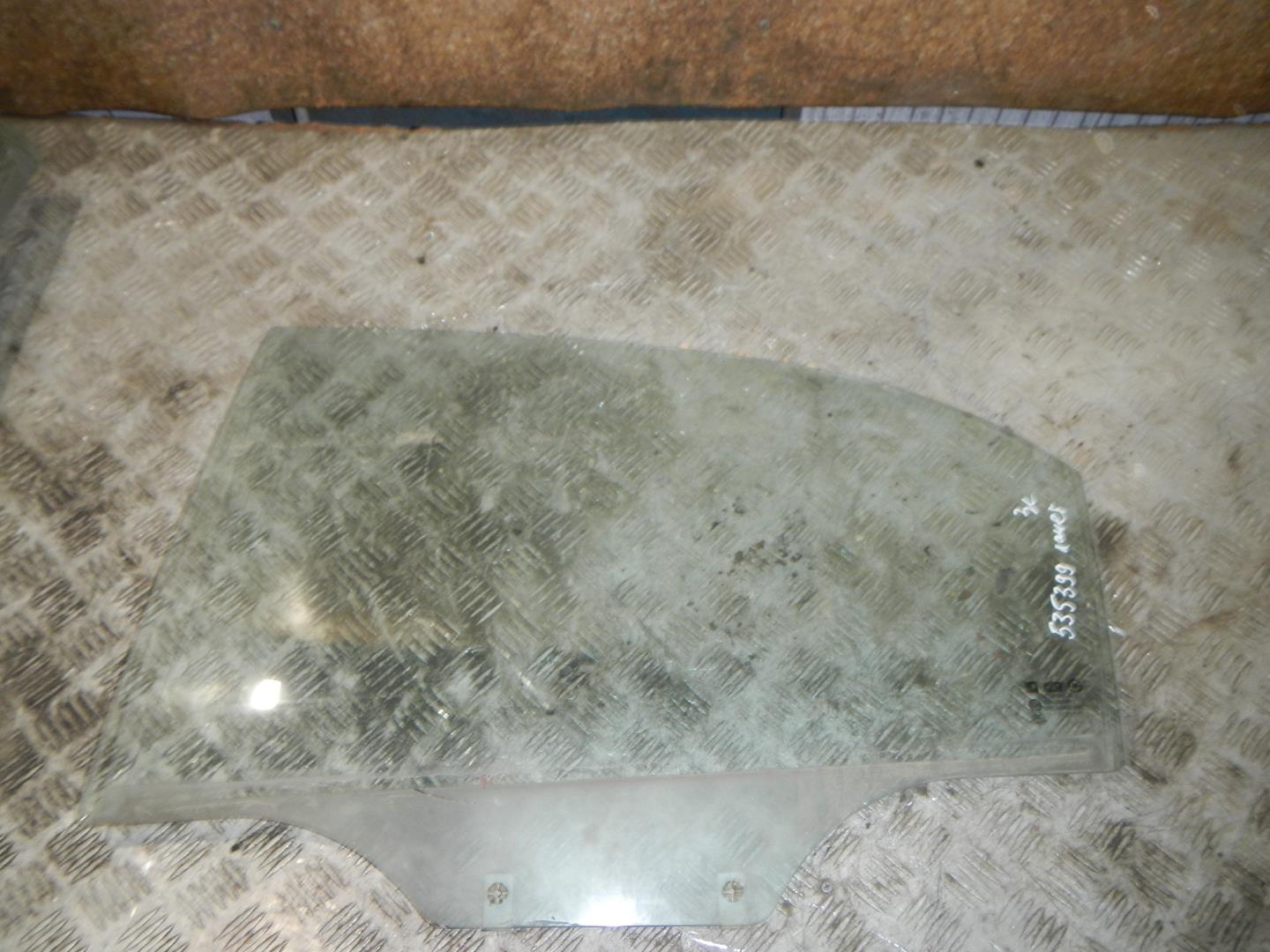 Стекло двери задней левой