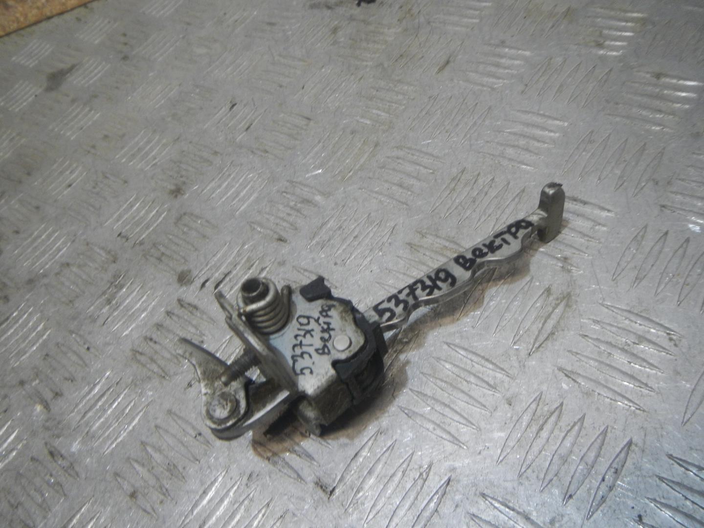 Ограничитель двери