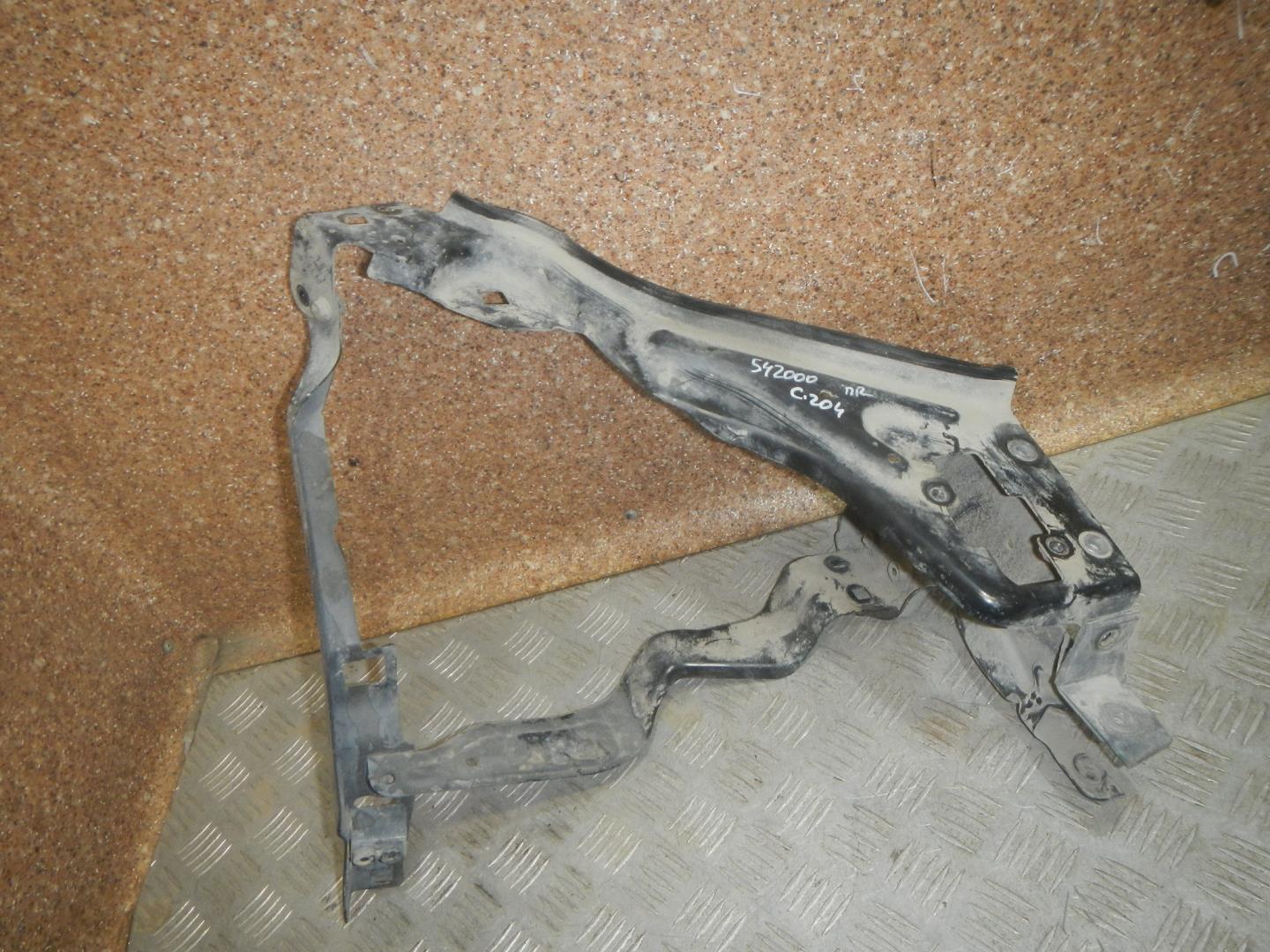 Кронштейн фар правый