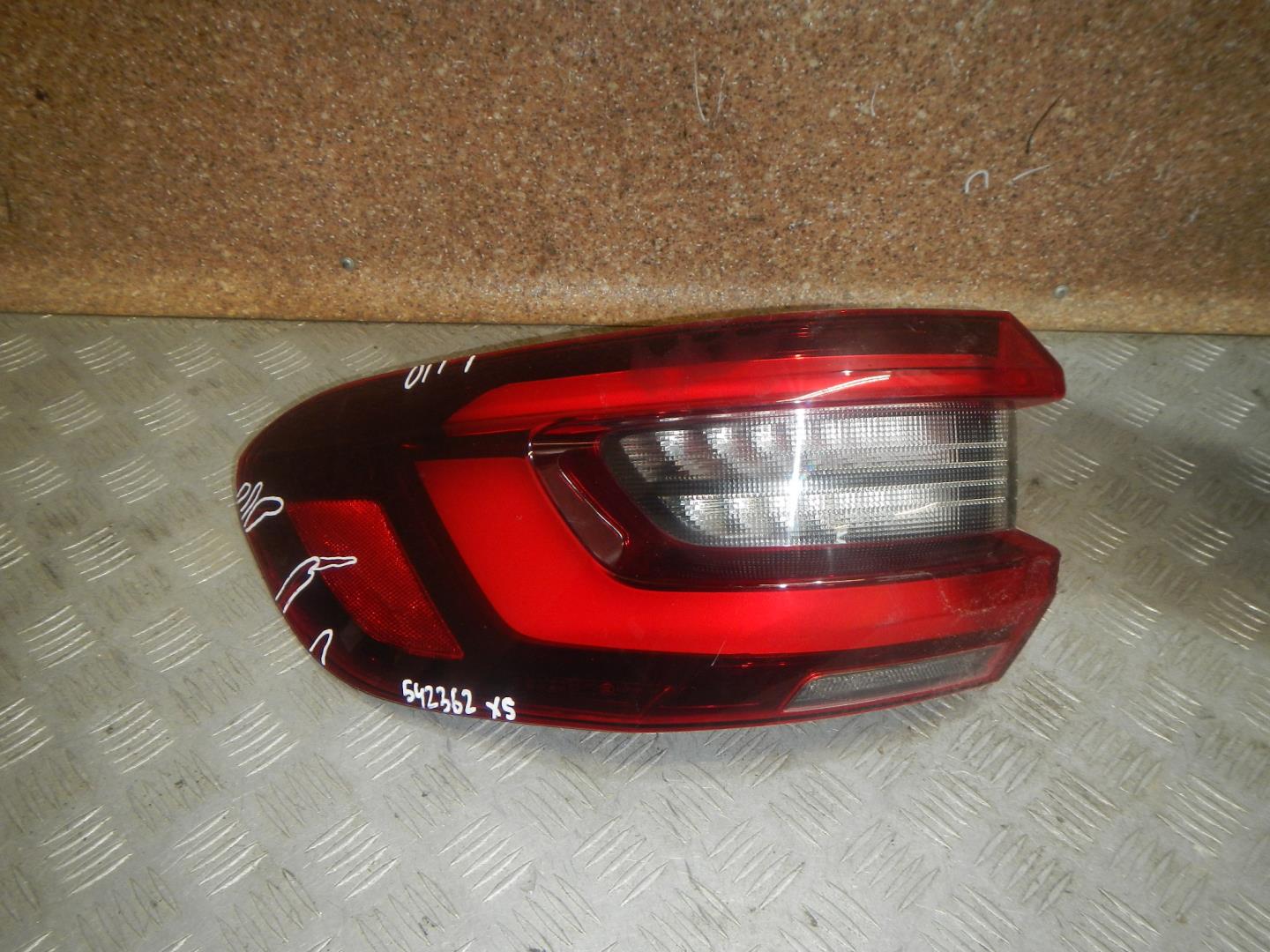 Фонарь задний левый