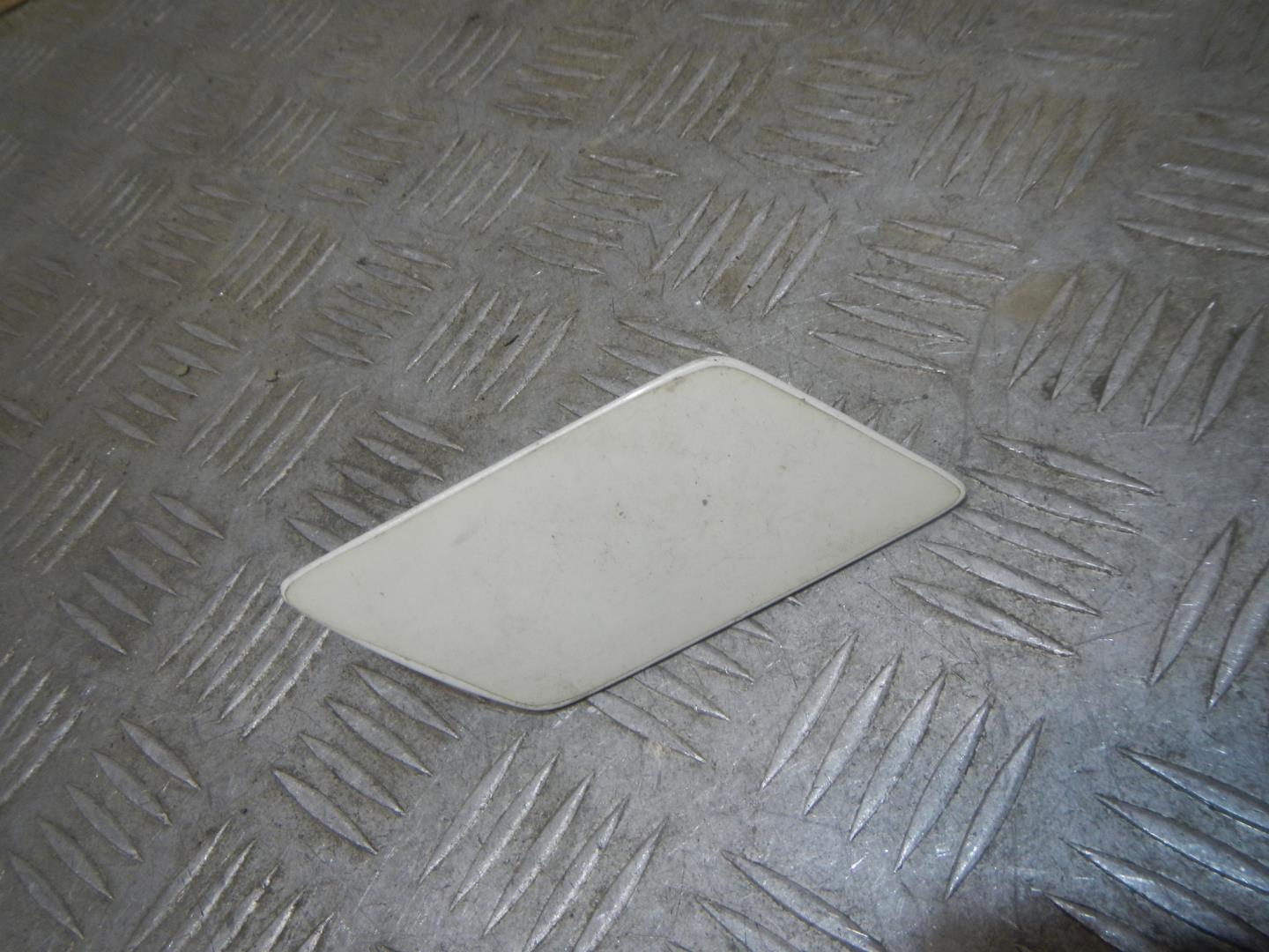 Крышка форсунки омывателя фар