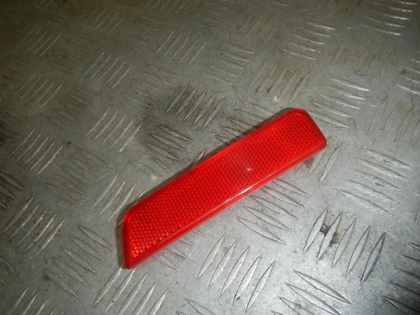 Отражатель в бампер задний правый