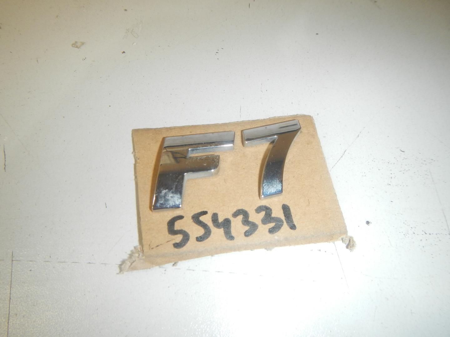 Эмблема на крышку багажника