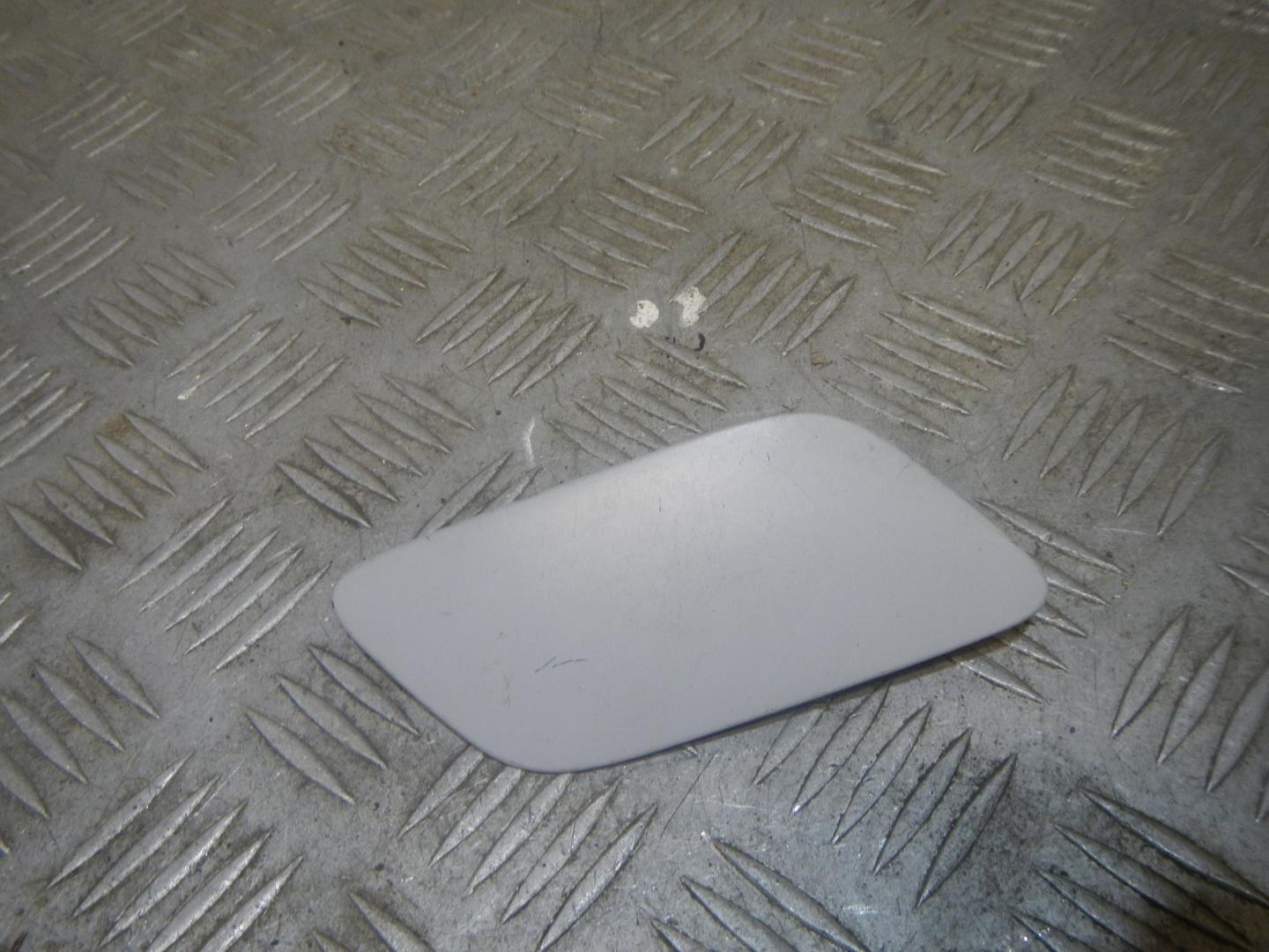 Крышка форсунки омывателя фар