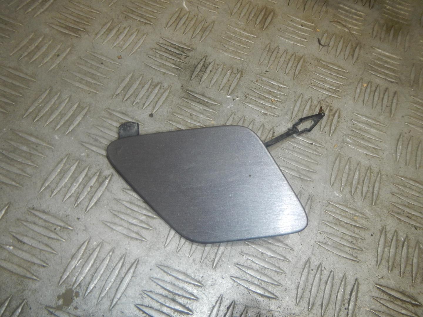 Заглушка буксировочного крюка