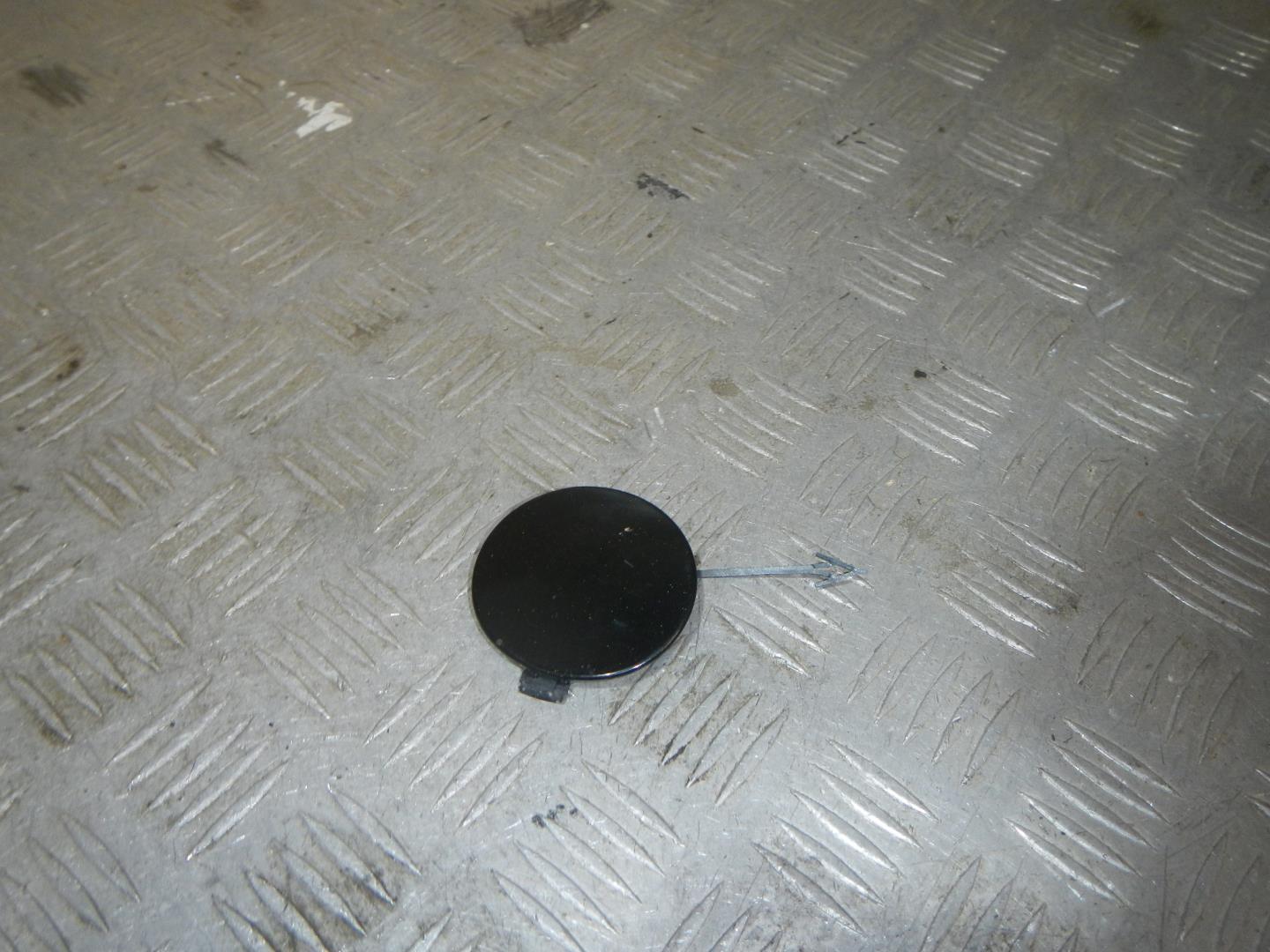 Заглушка буксировочного крюка