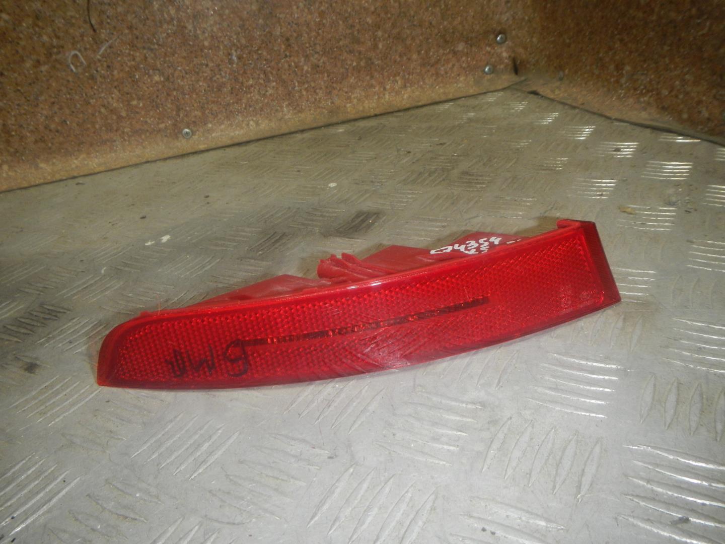 Отражатель в бампер задний левый