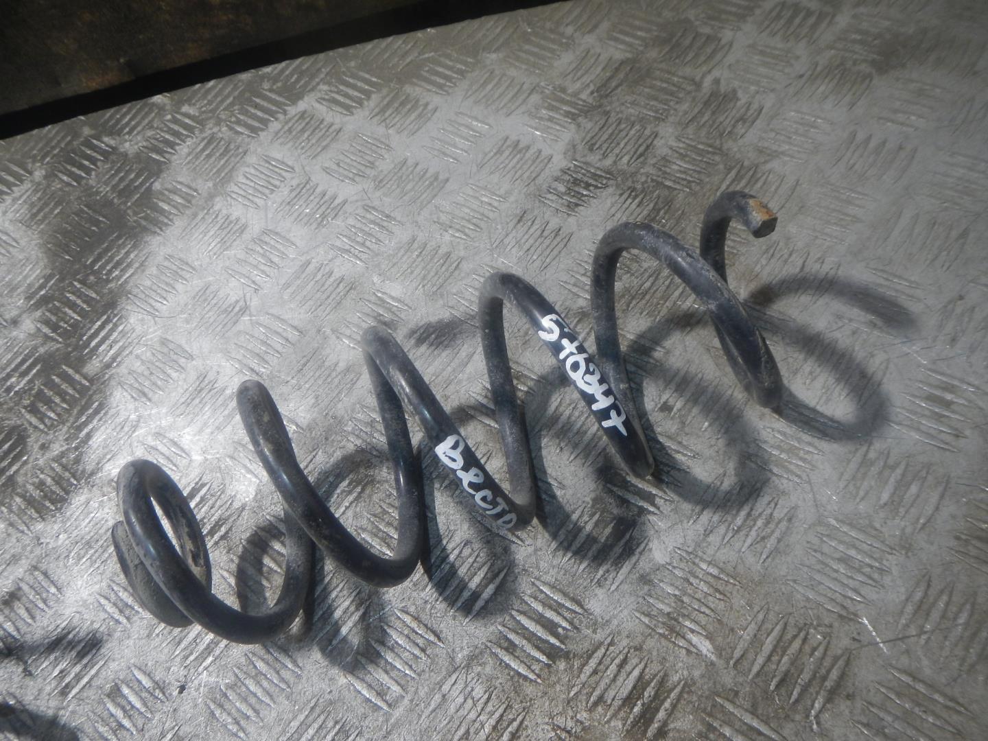 Пружина задняя