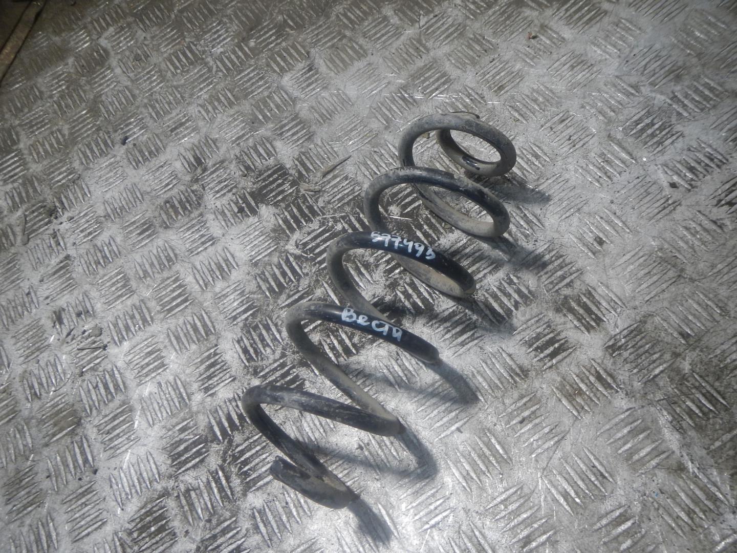 Пружина задняя