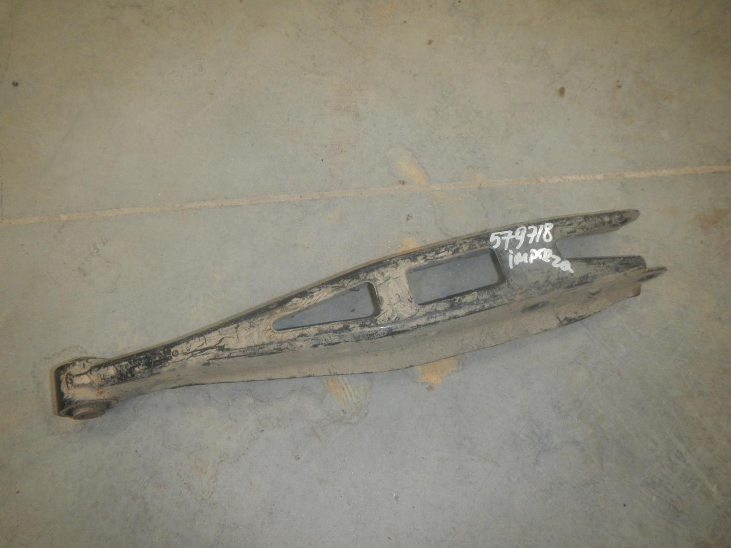 Рычаг задний нижний левый