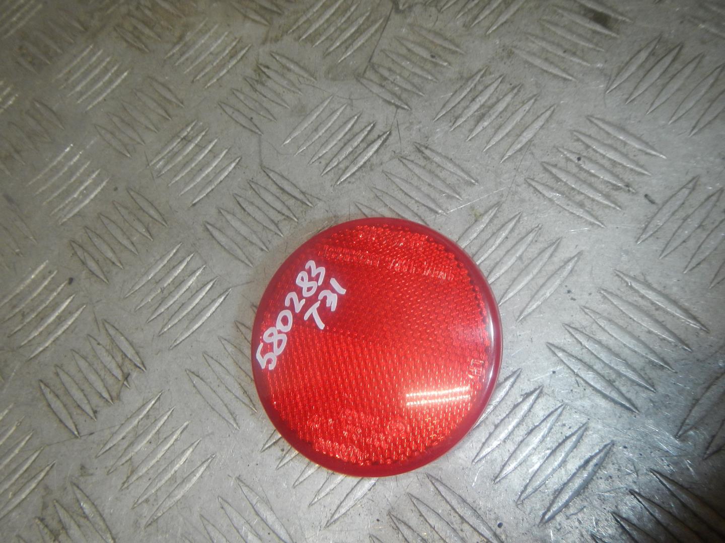 Отражатель в бампер задний левый