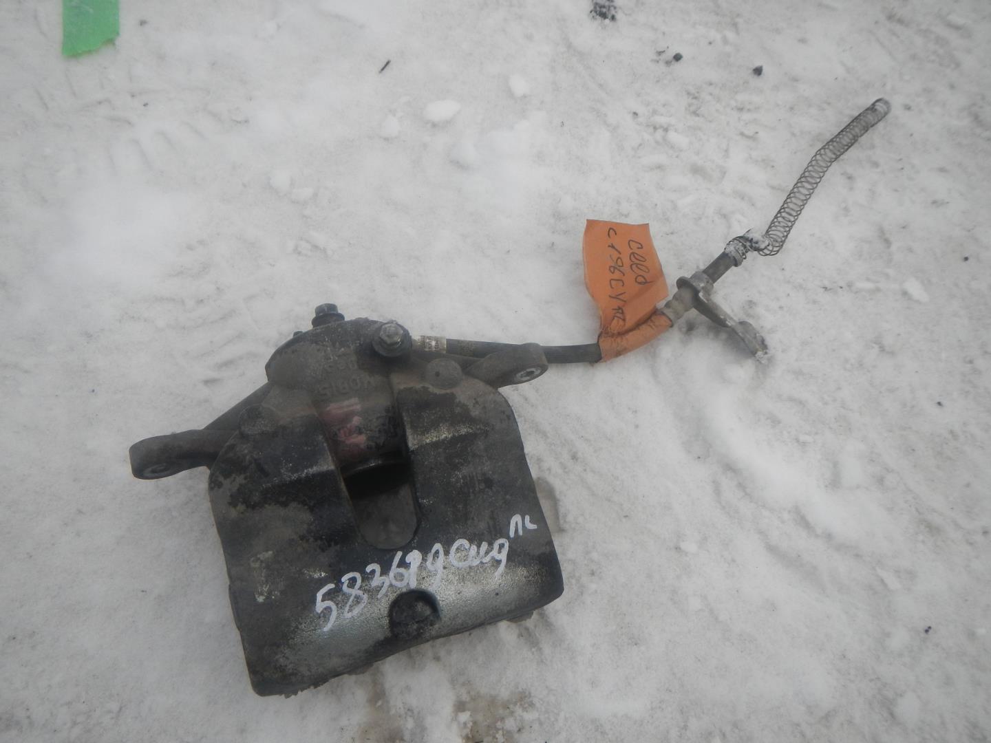 Суппорт передний левый