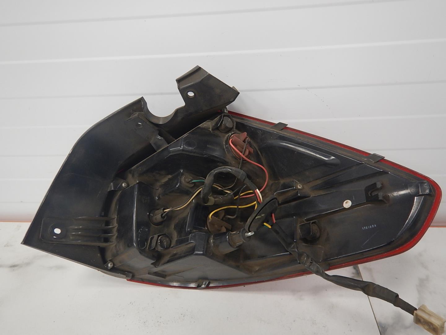 Фонарь задний левый