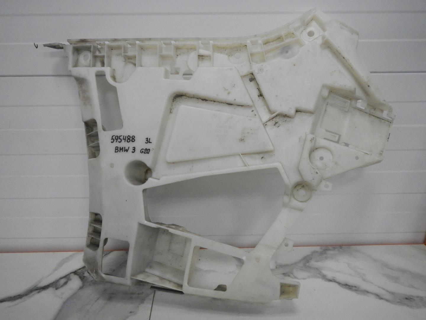 Кронштейн заднего бампера левый