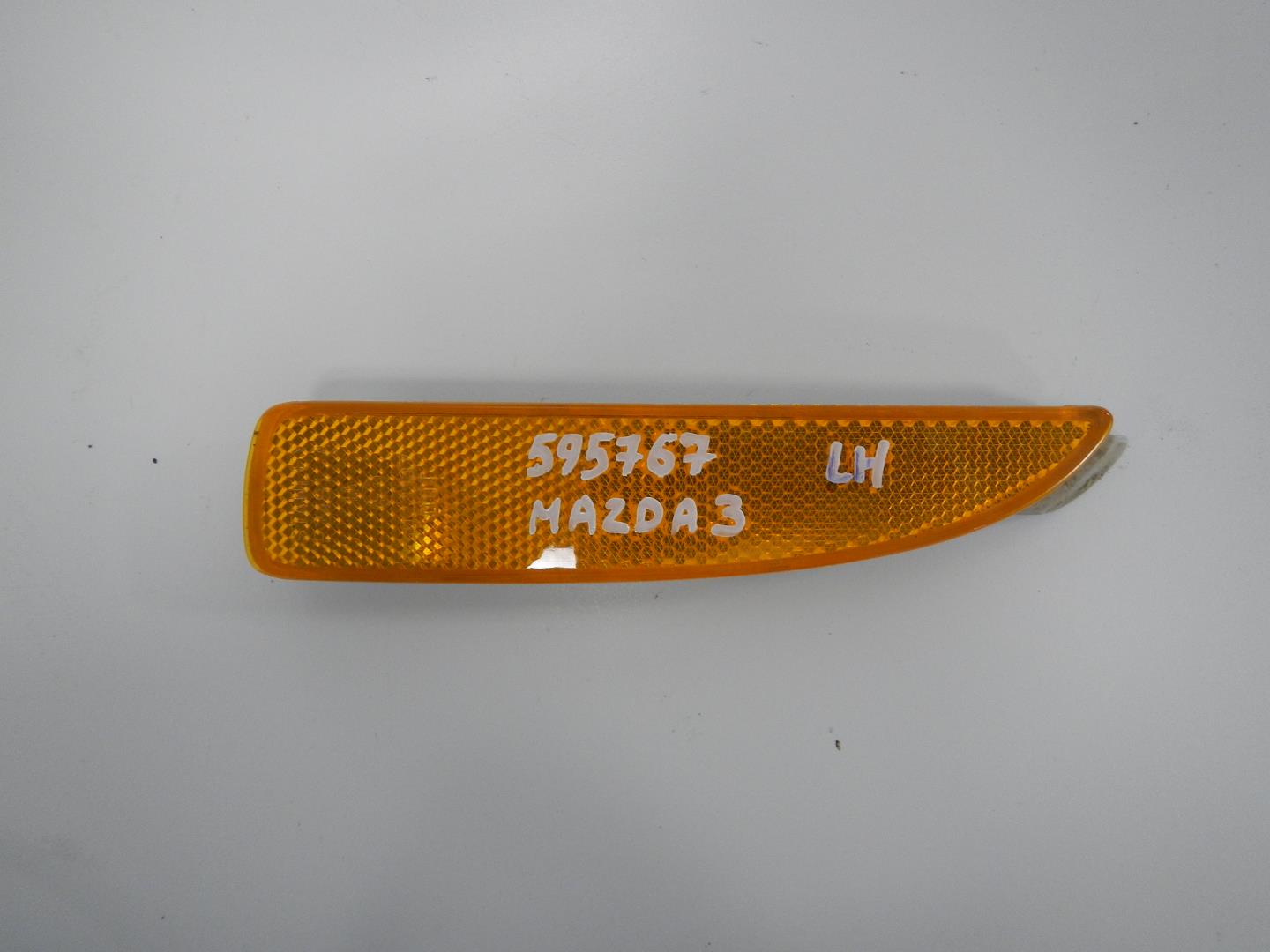 Отражатель в бампер задний левый