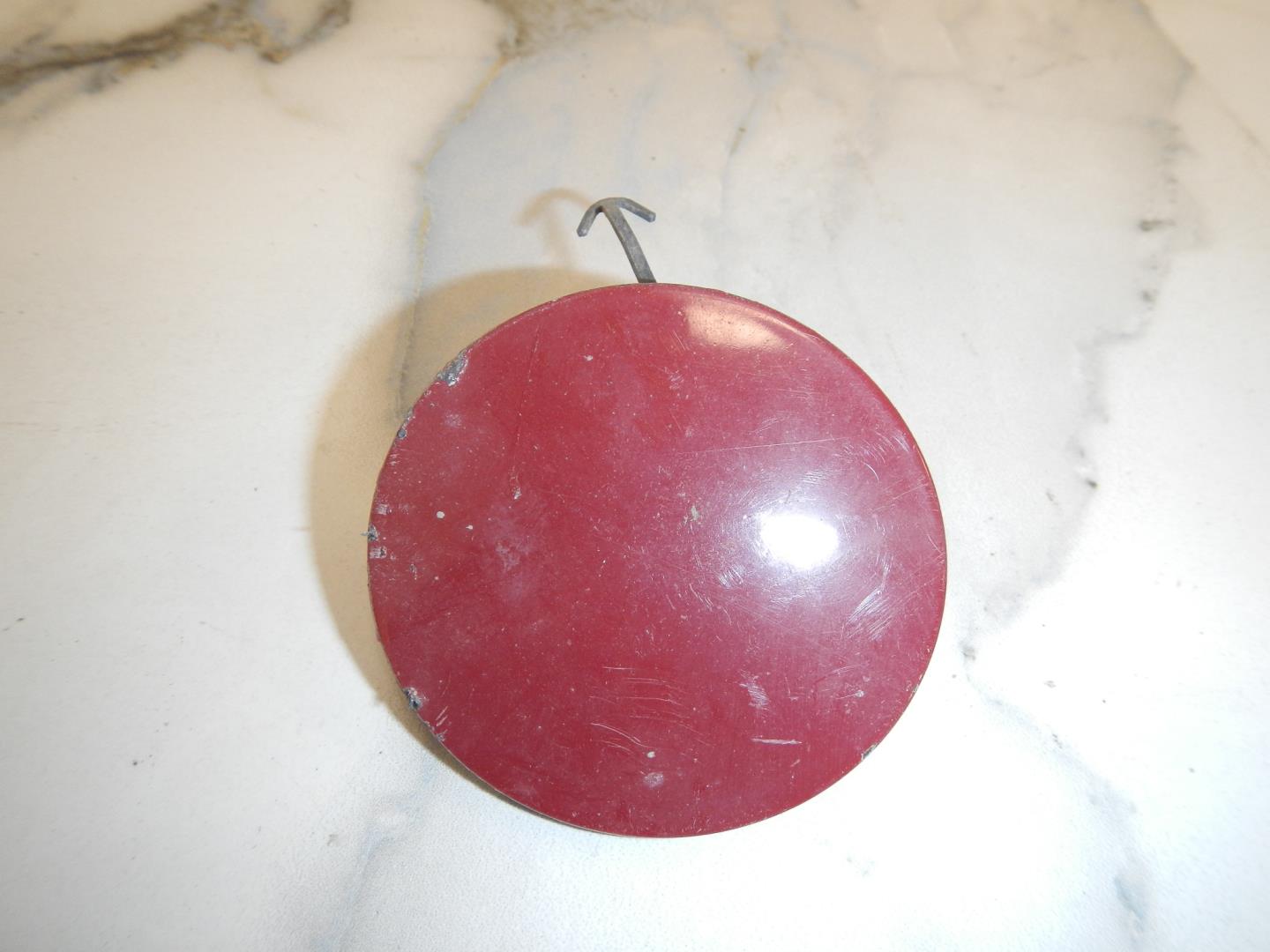 Заглушка буксировочного крюка