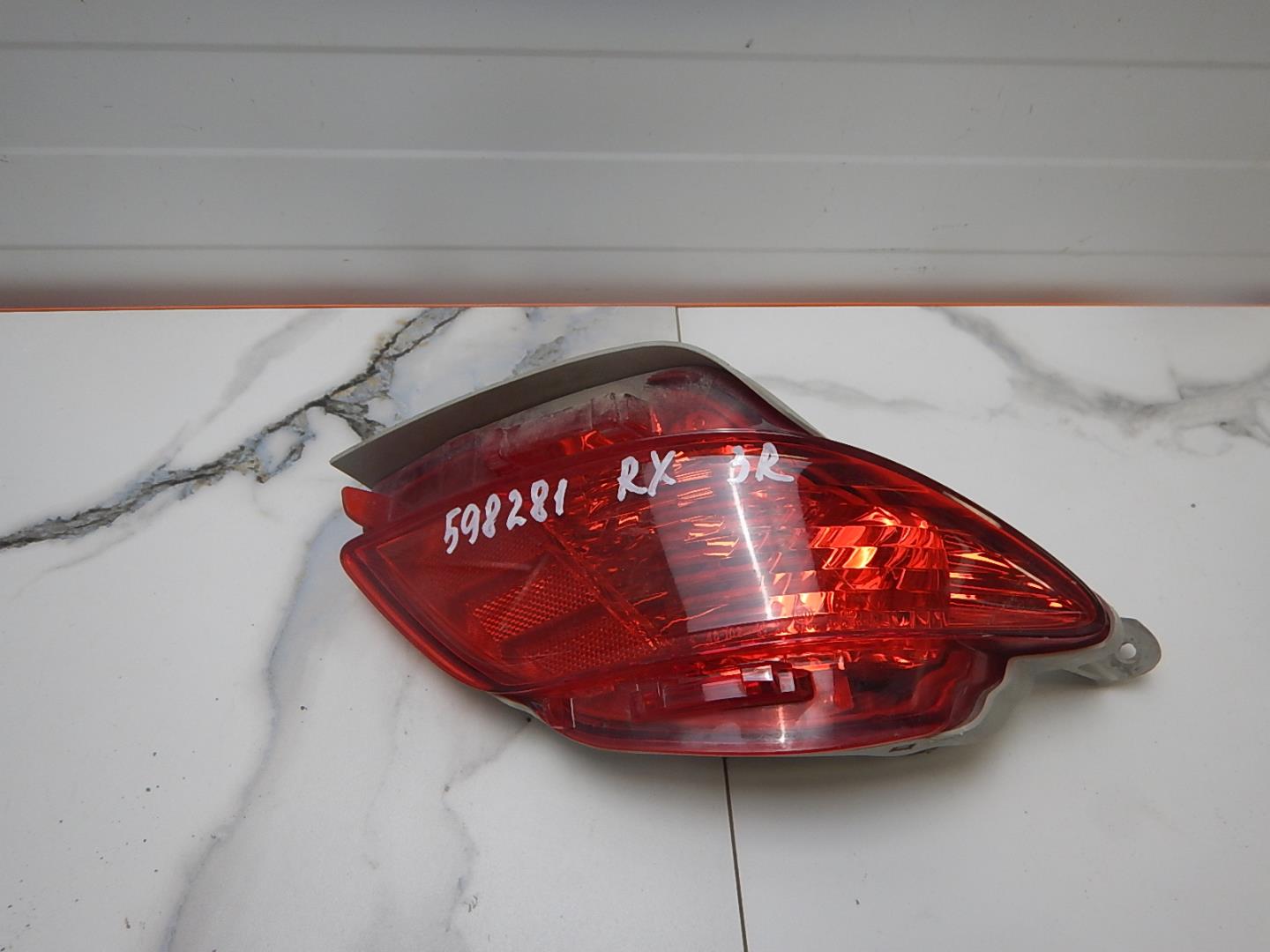 Фонарь задний противотуманный