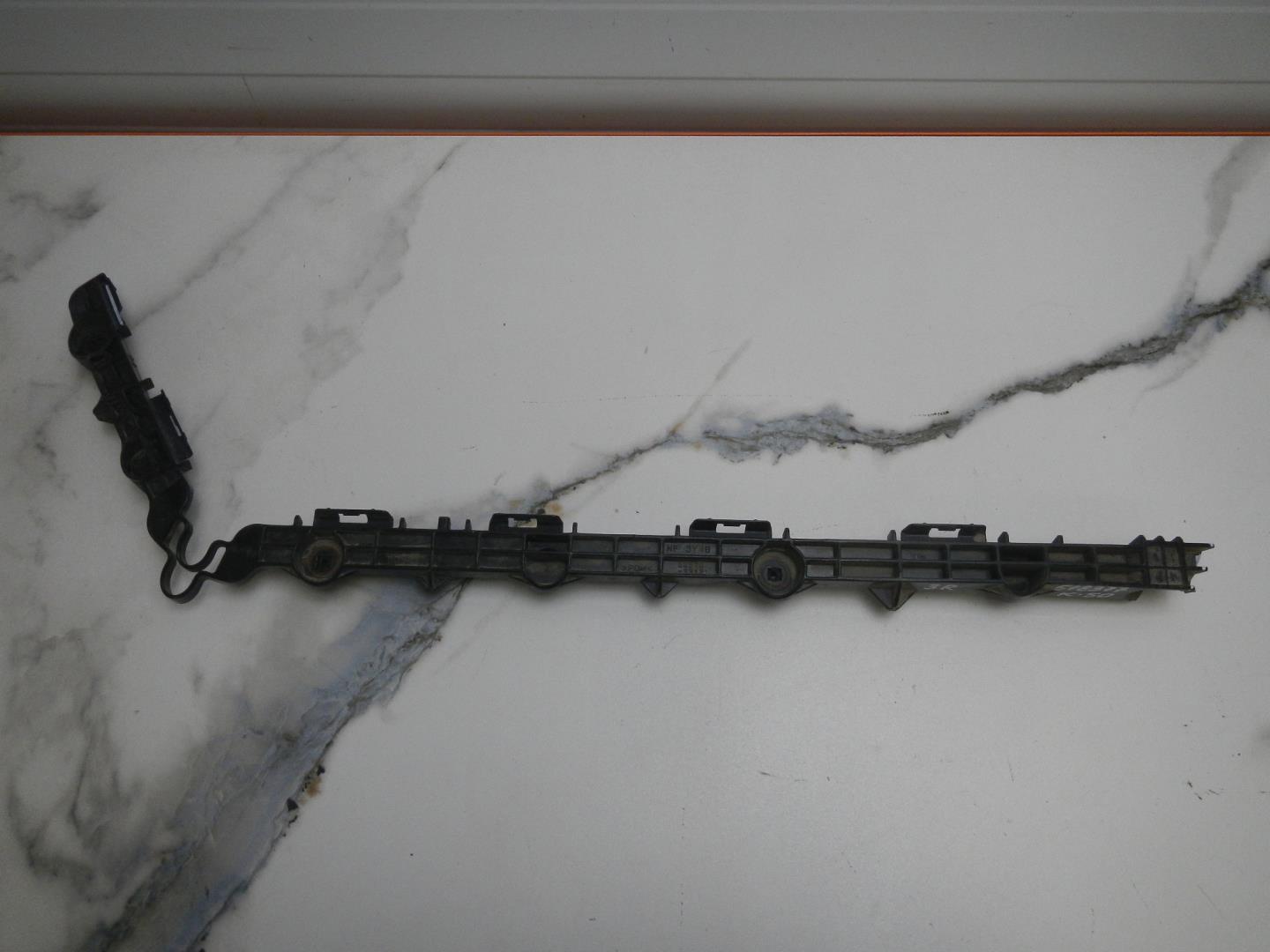 Кронштейн заднего бампера правый