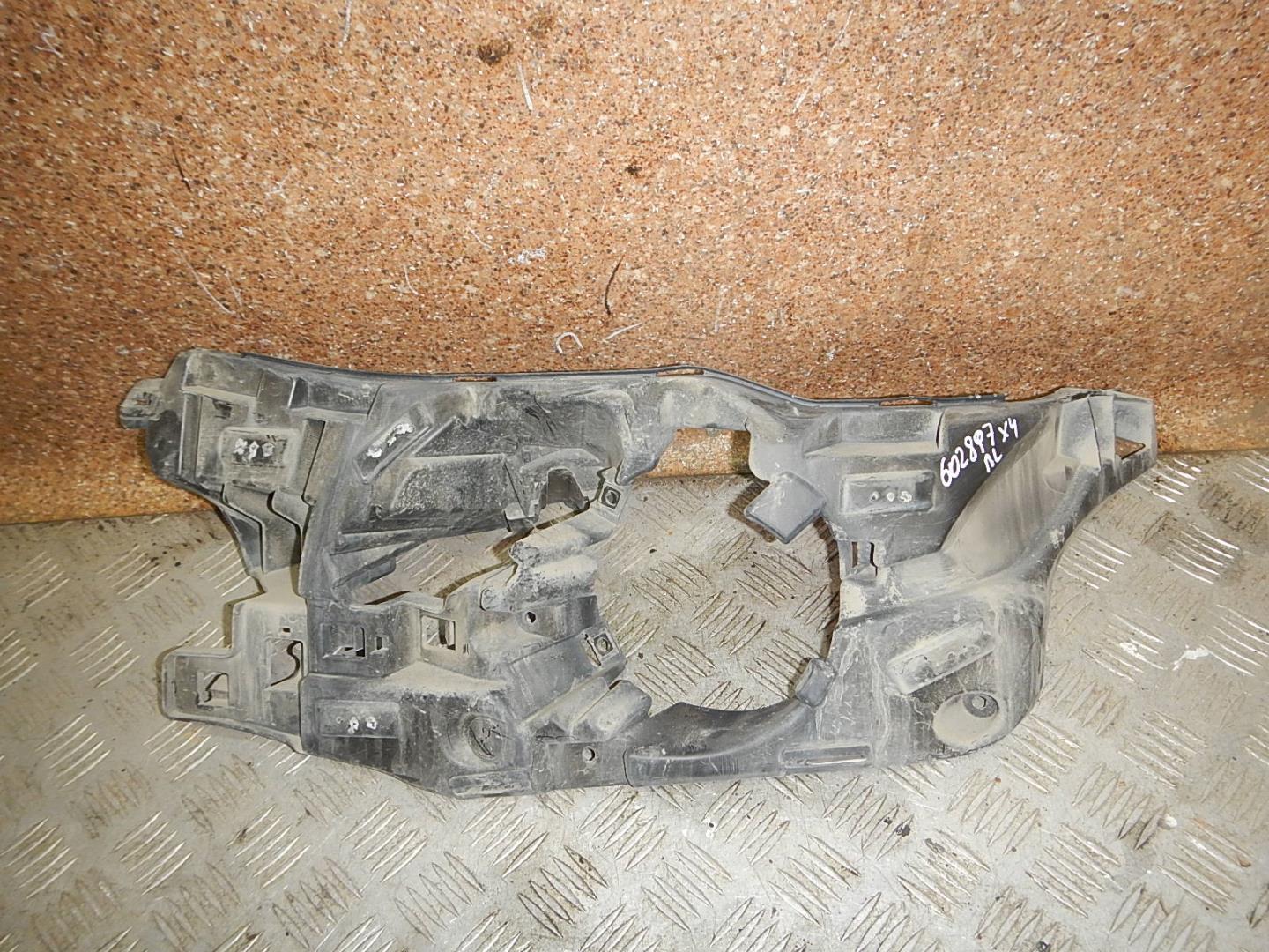 Кронштейн переднего бампера левый