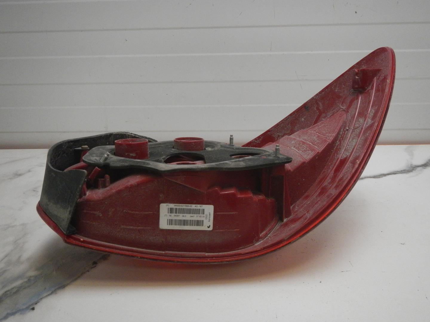 Фонарь задний левый