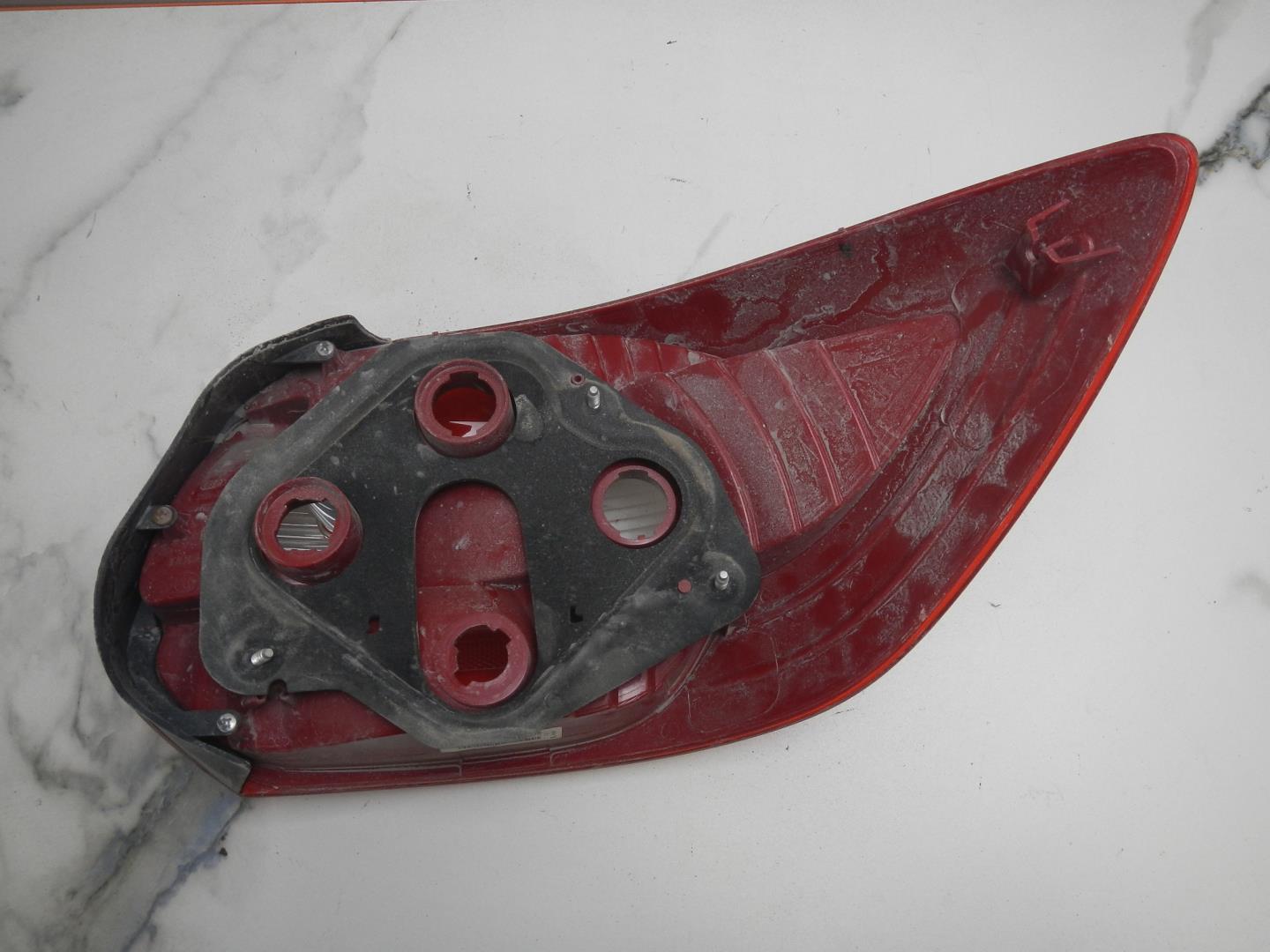 Фонарь задний левый