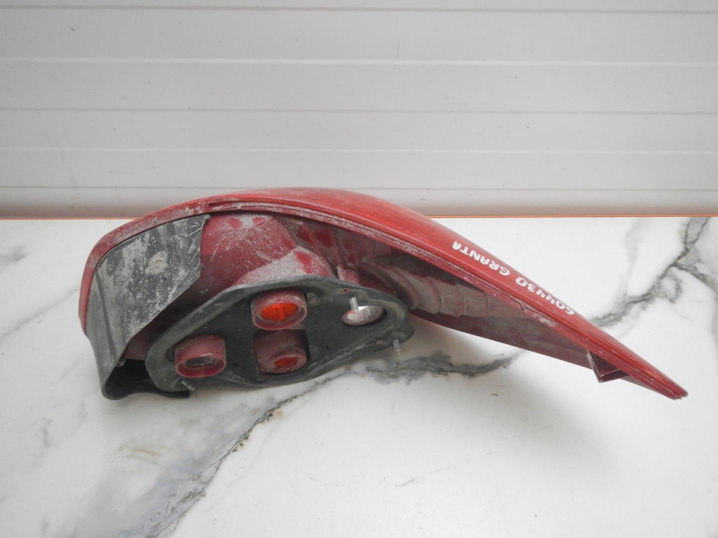 Фонарь задний левый