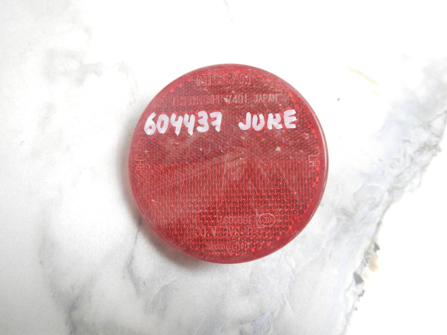 Отражатель в бампер задний левый