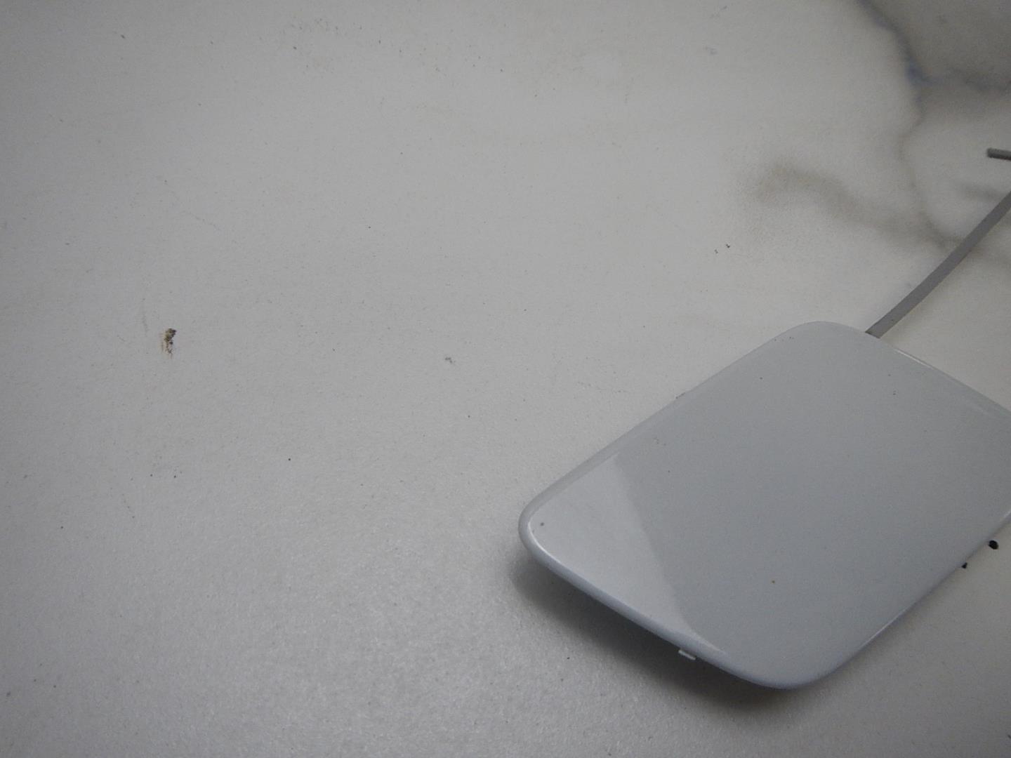 Заглушка буксировочного крюка