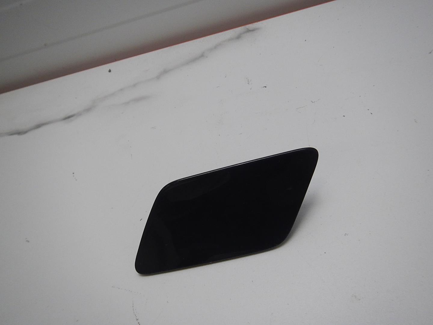 Крышка форсунки омывателя фар