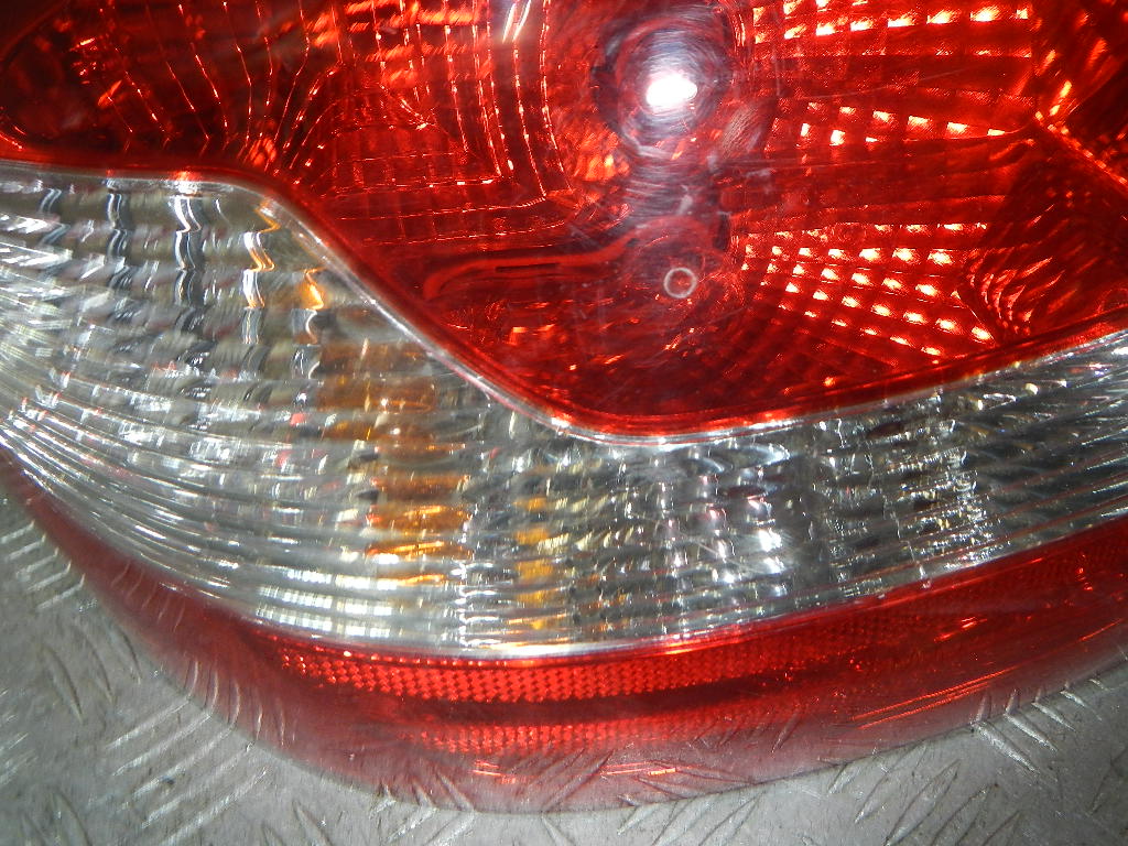 Фонарь задний левый