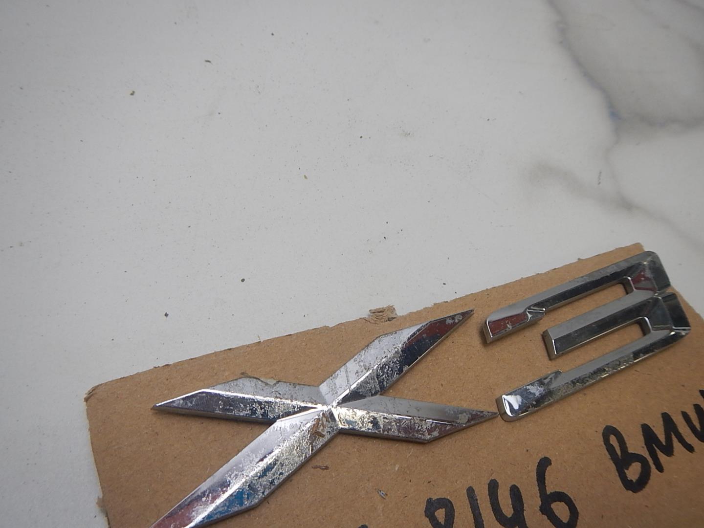 Эмблема на крышку багажника