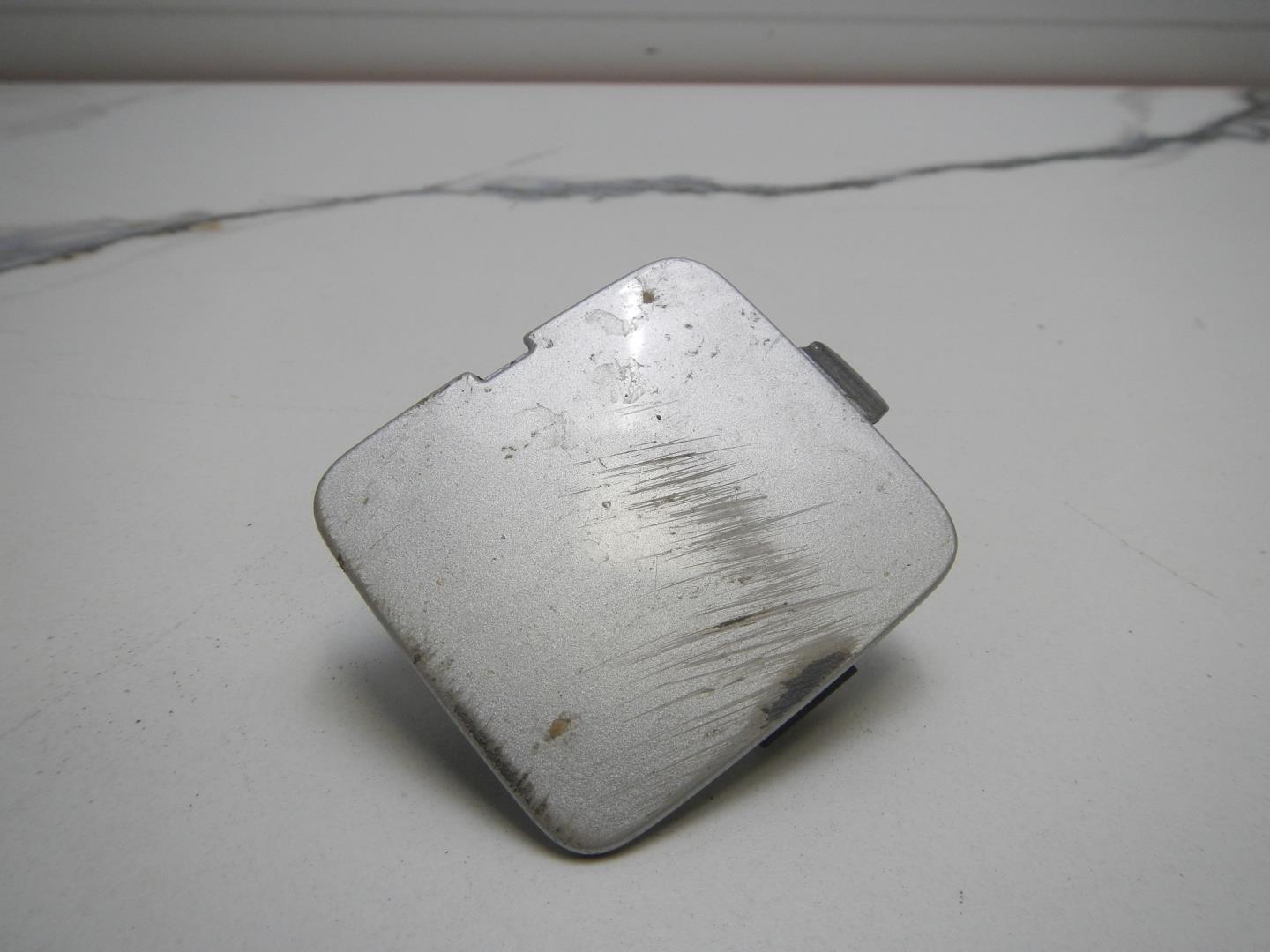 Заглушка буксировочного крюка