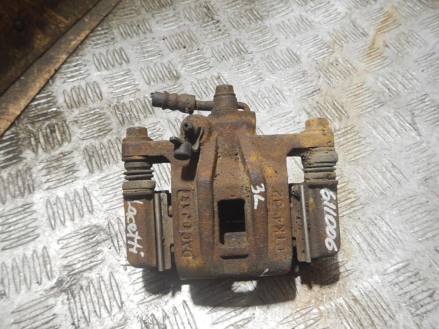 Суппорт задний левый