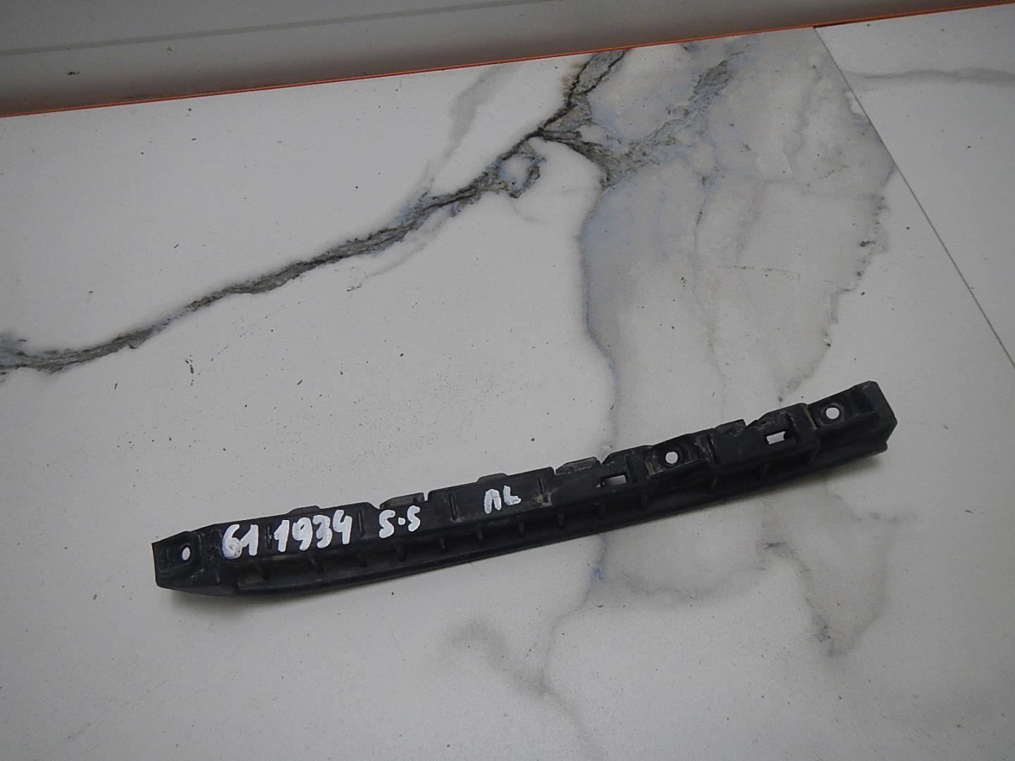 Кронштейн фар левый