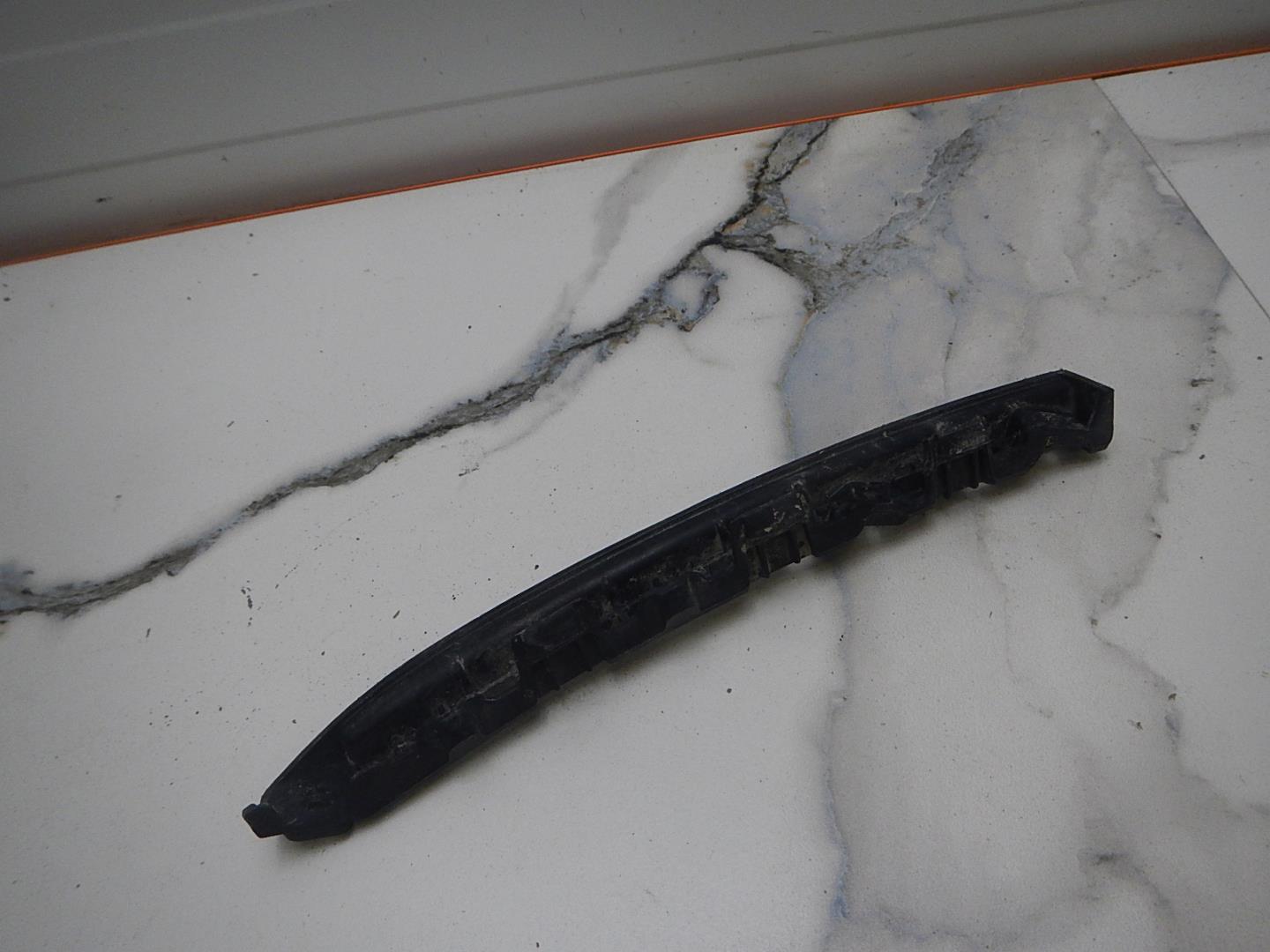 Кронштейн фар левый