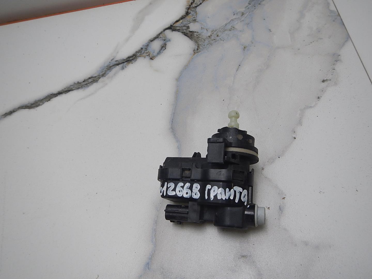 Моторчик корректора фары