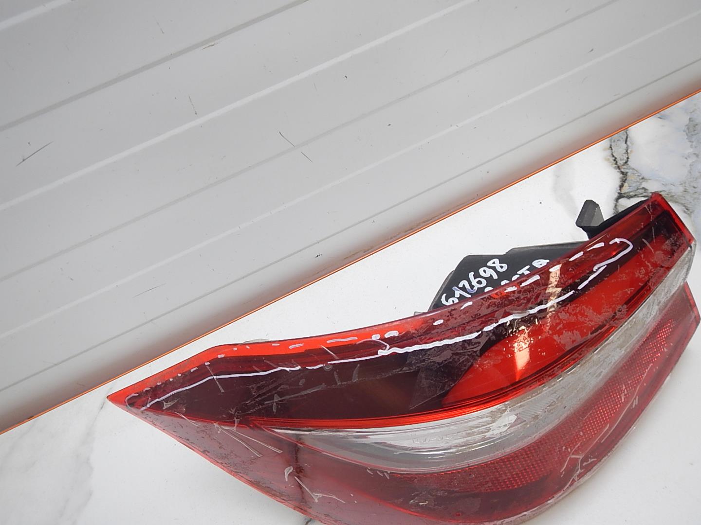 Фонарь задний левый