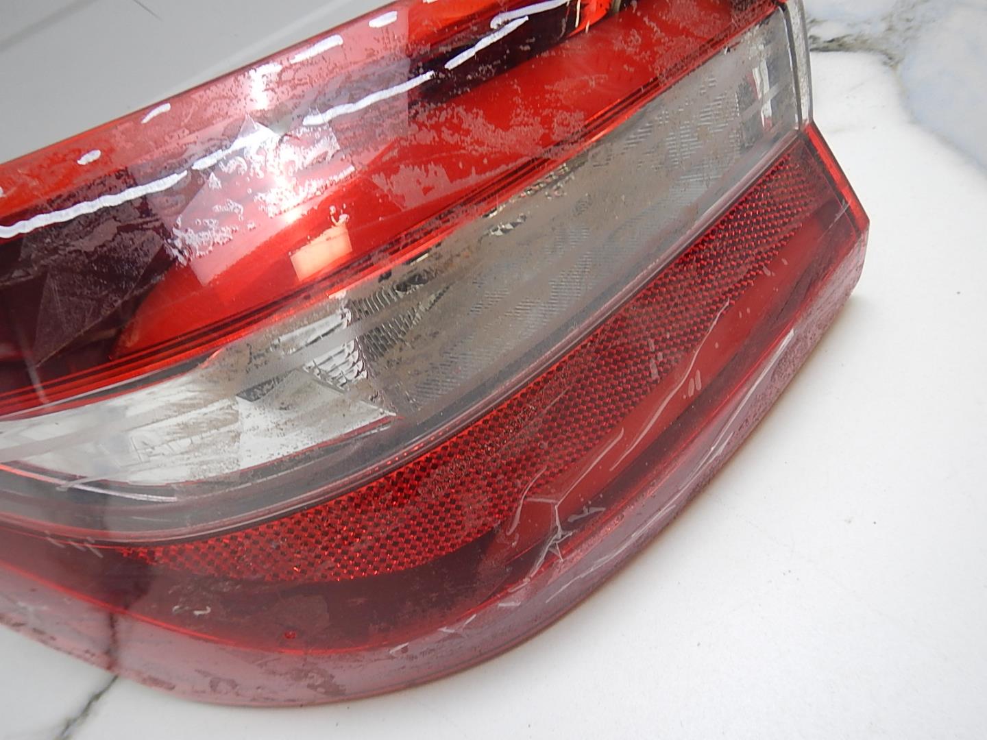 Фонарь задний левый