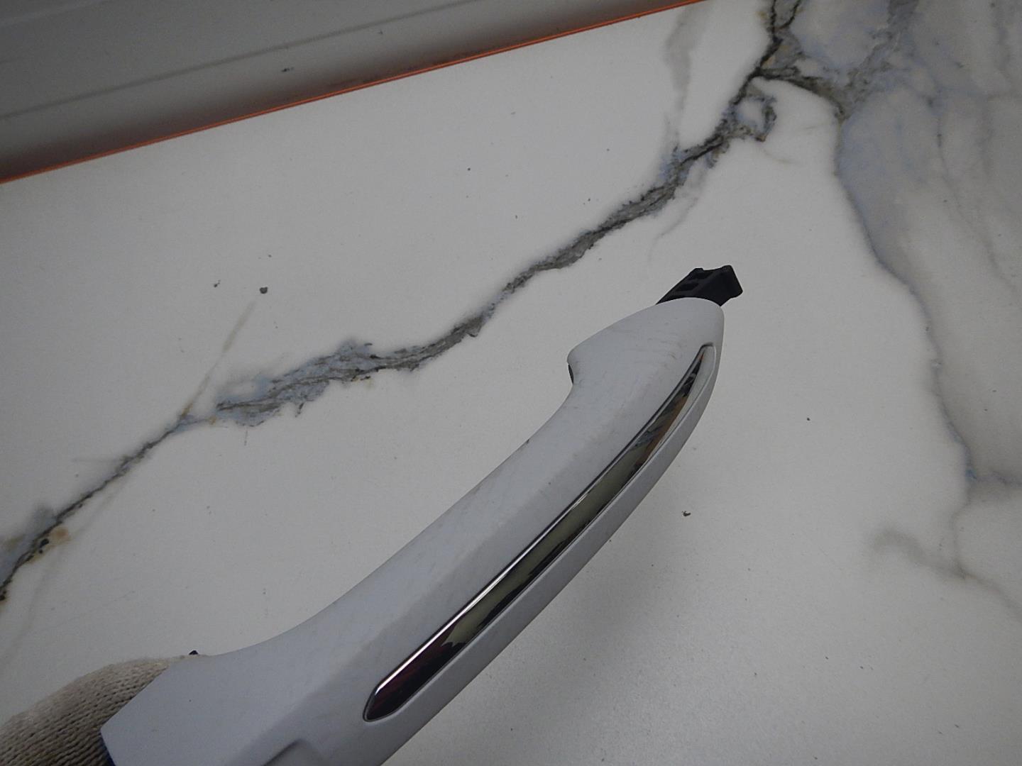 Ручка двери передней наружная левая