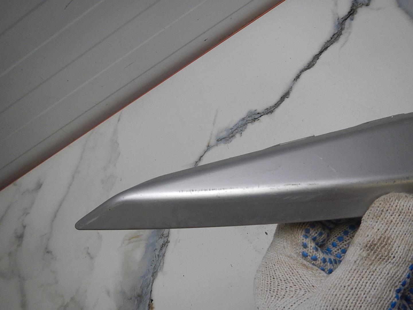 Молдинг переднего бампера левый