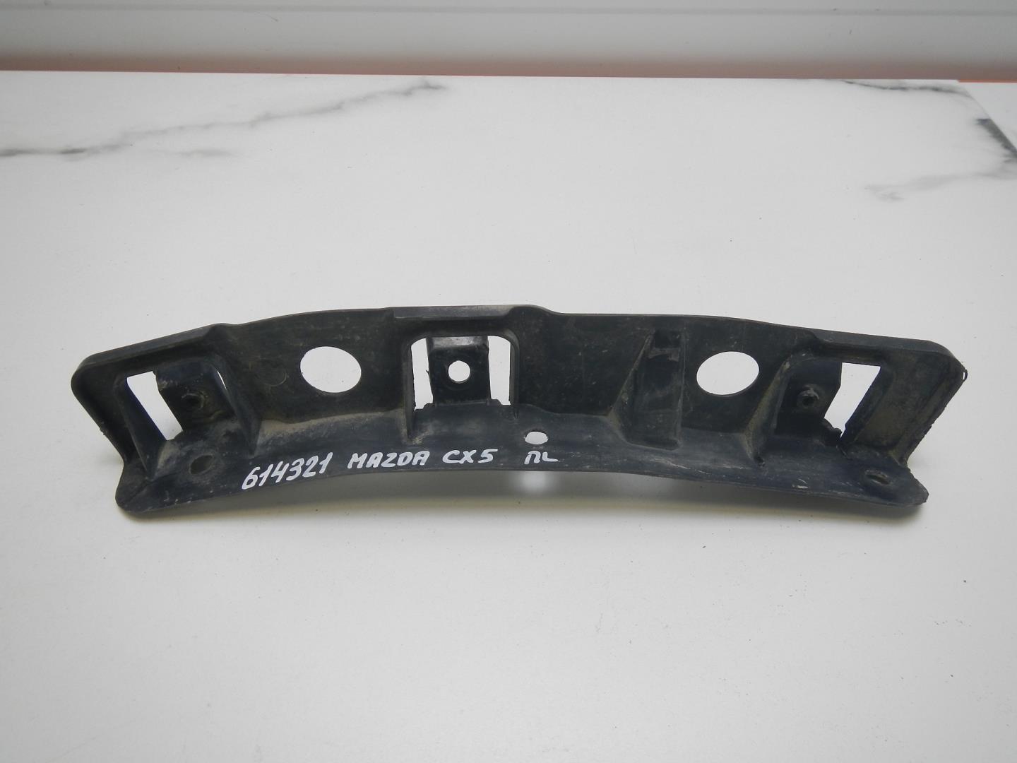 Кронштейн переднего бампера левый