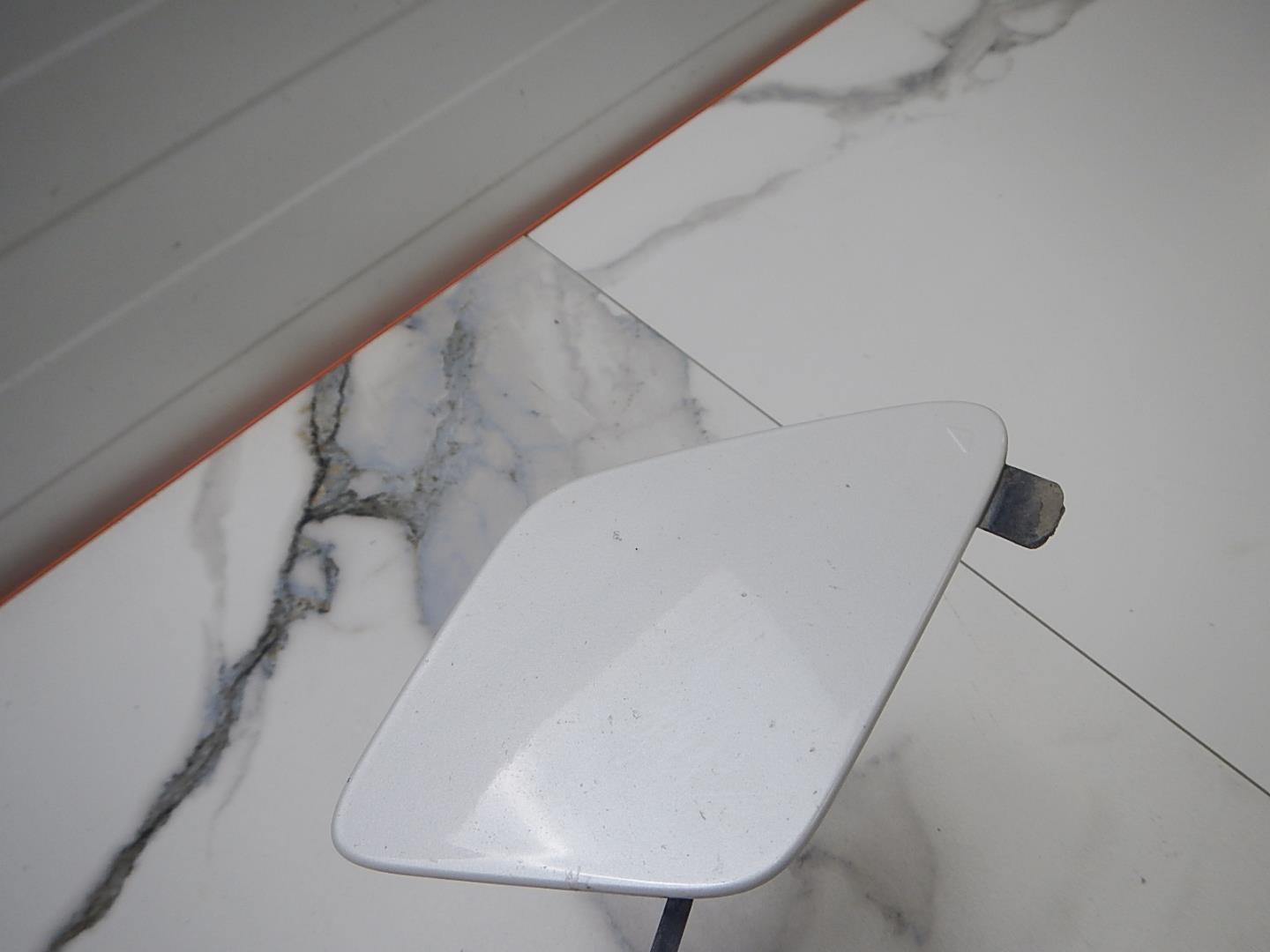 Заглушка буксировочного крюка