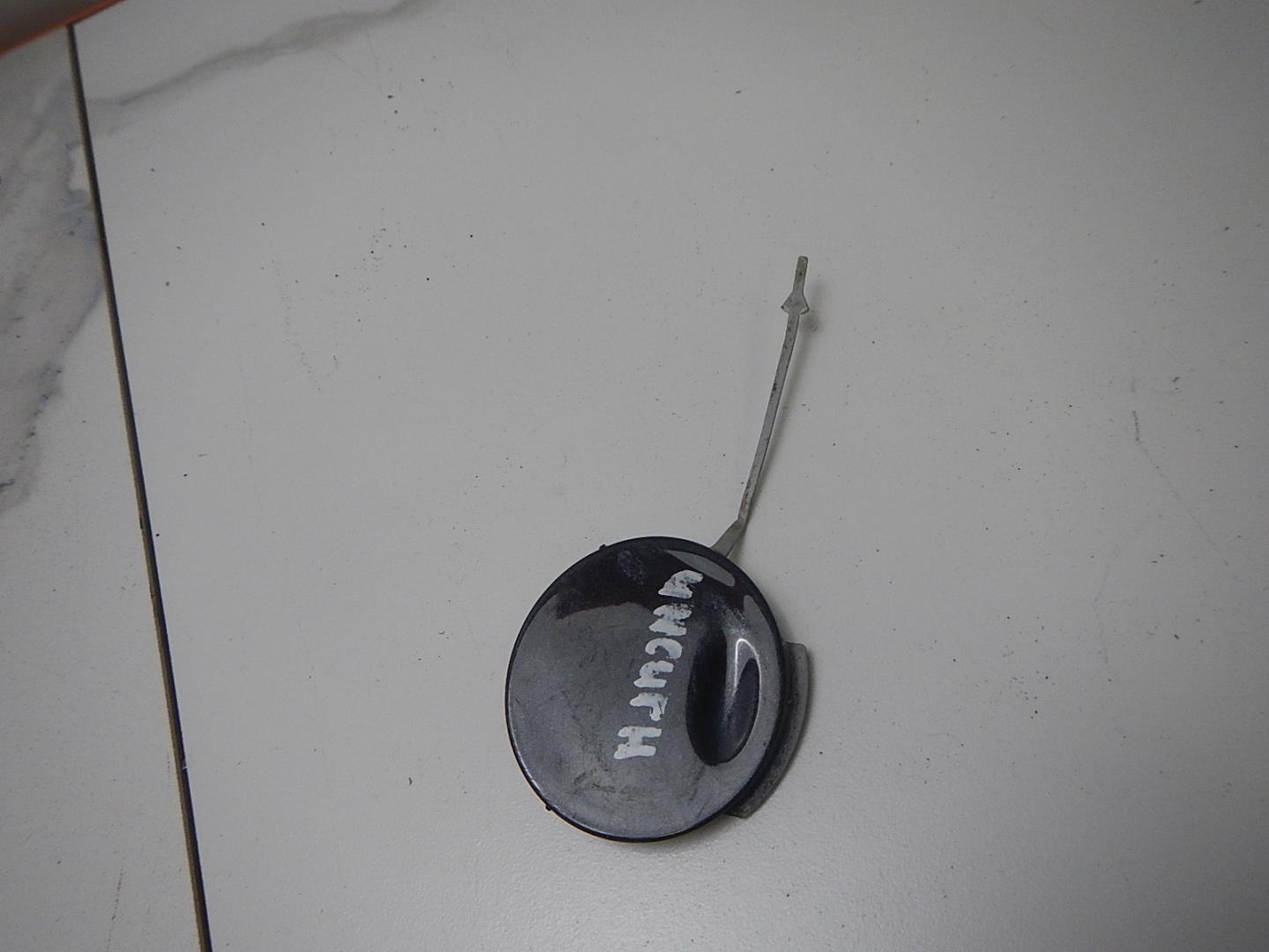 Заглушка буксировочного крюка