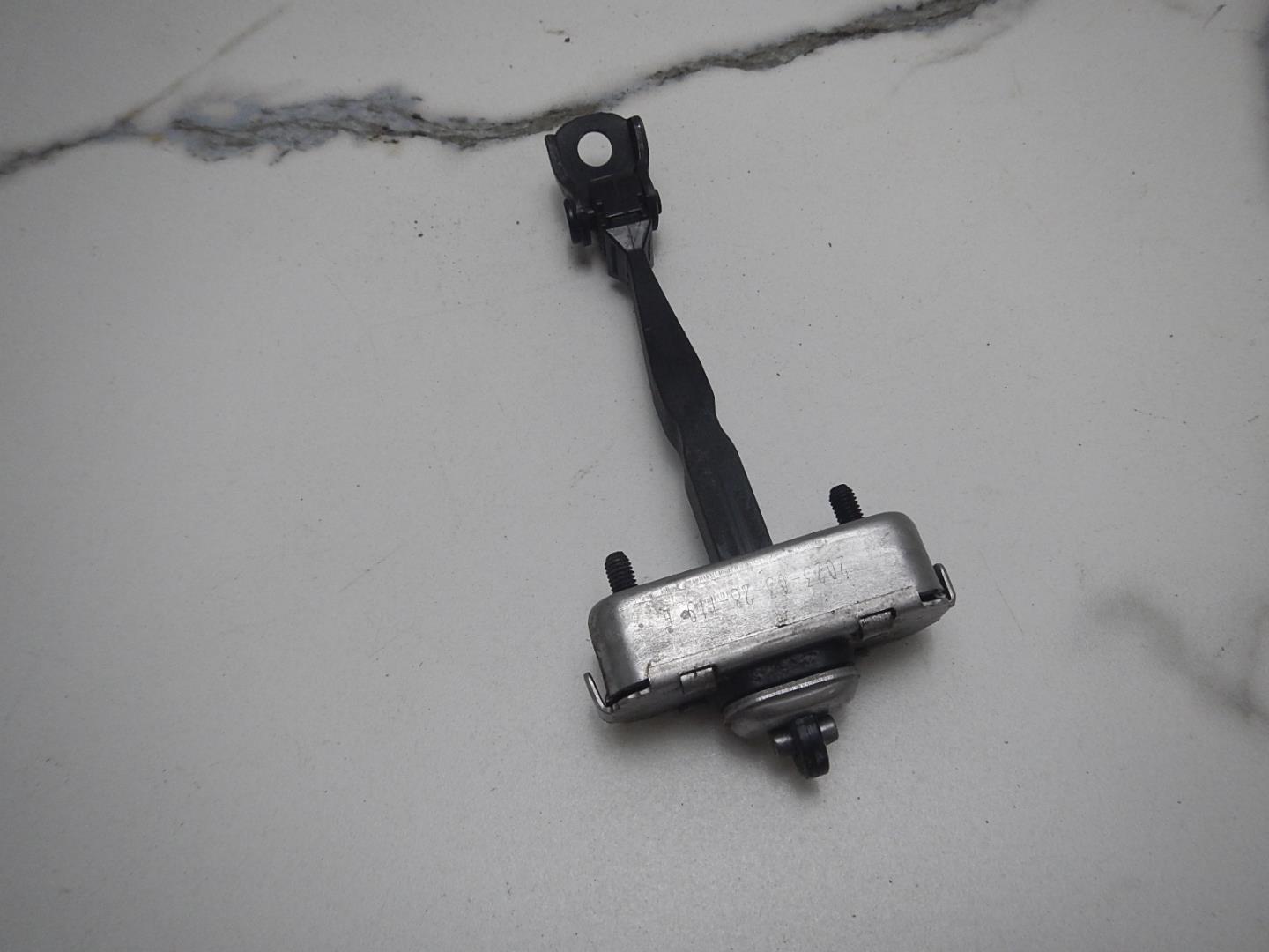 Ограничитель двери