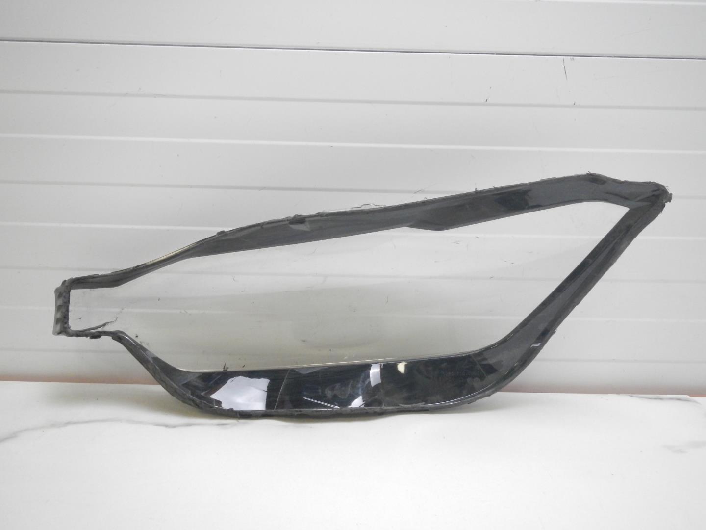 Стекло фары правой