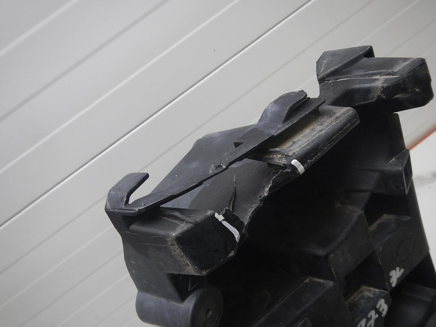 Кронштейн заднего бампера левый