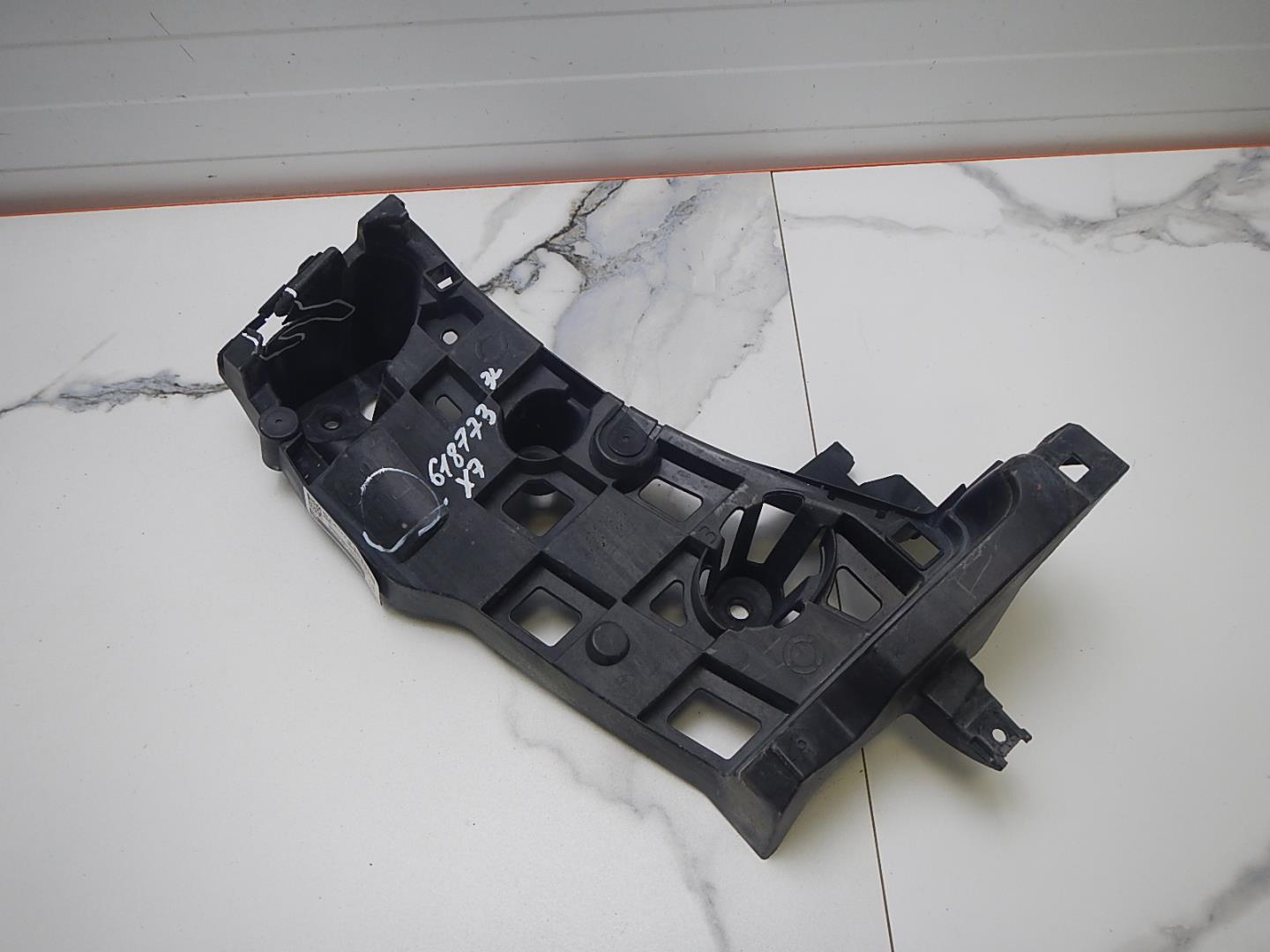 Кронштейн заднего бампера левый