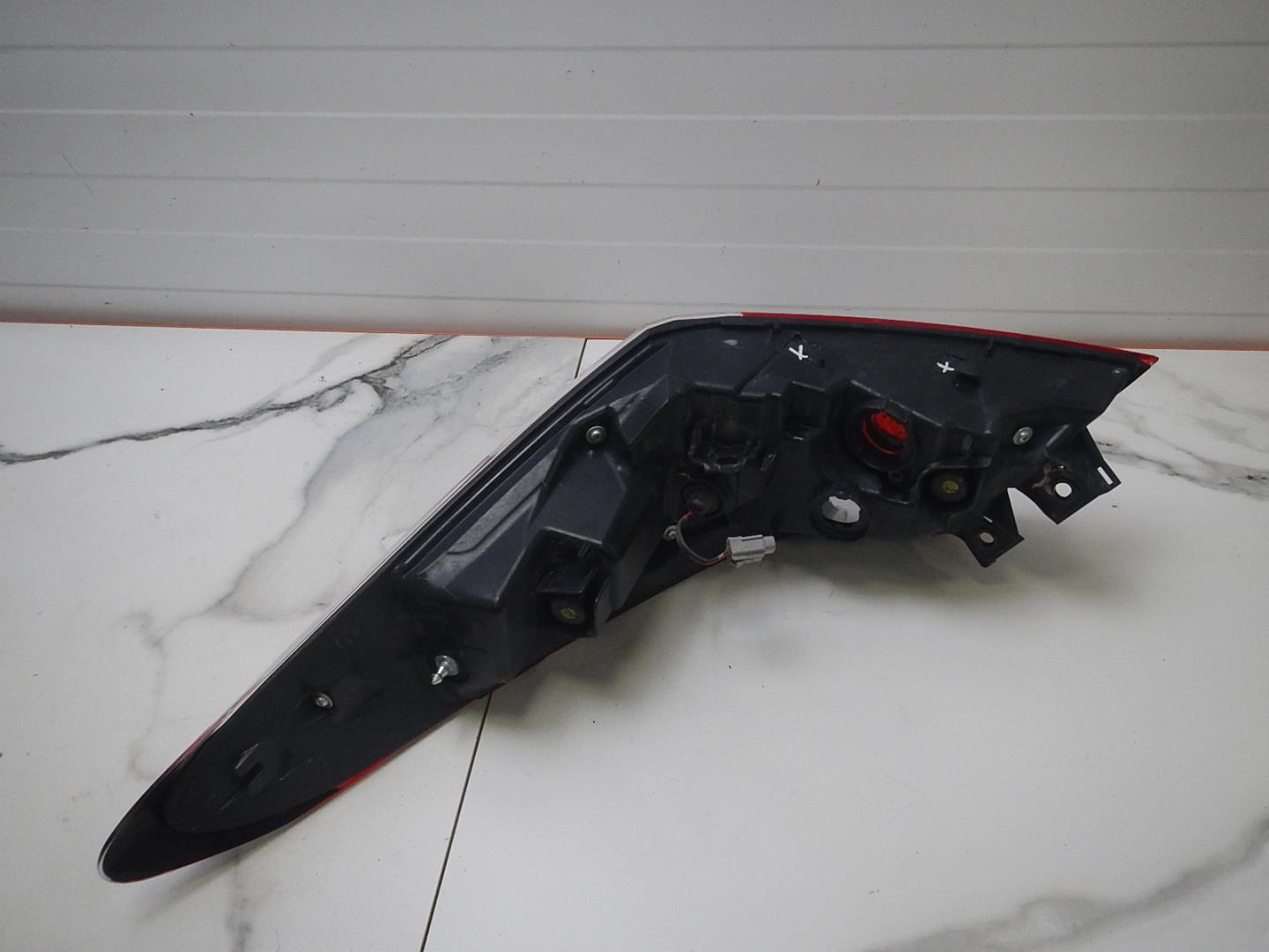 Фонарь задний левый