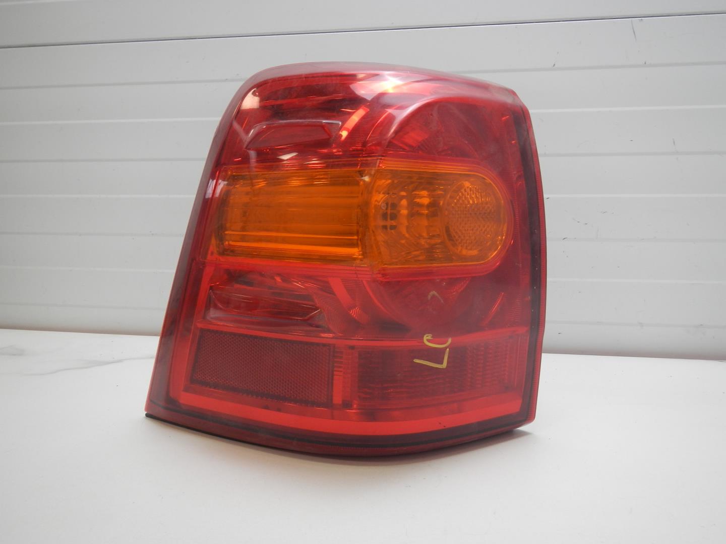 Фонарь задний левый